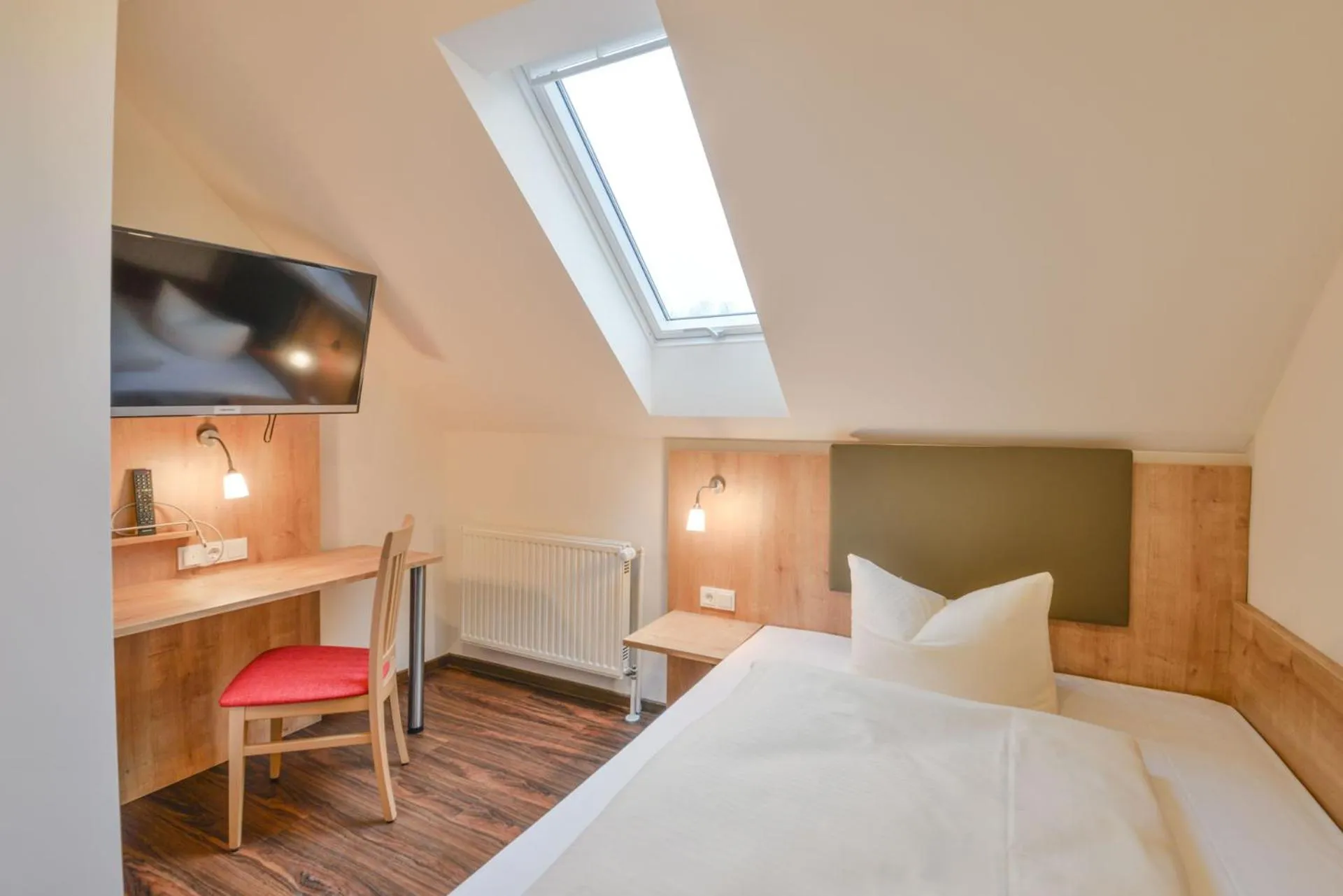 Photo of the whole room, Bed in Hotel Gasthof Hainzinger