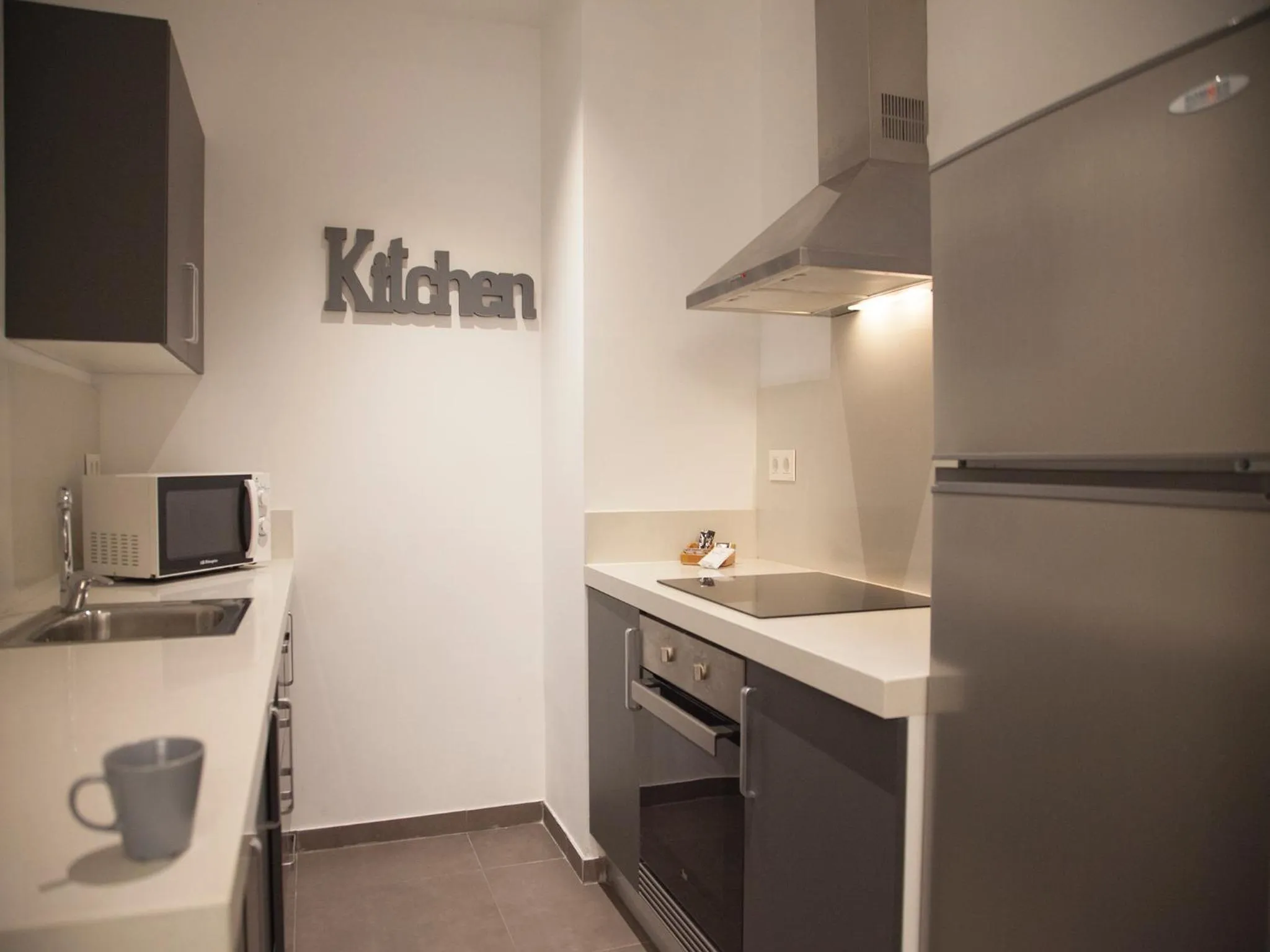 Kitchen or kitchenette in Flats Friends Soho Suites