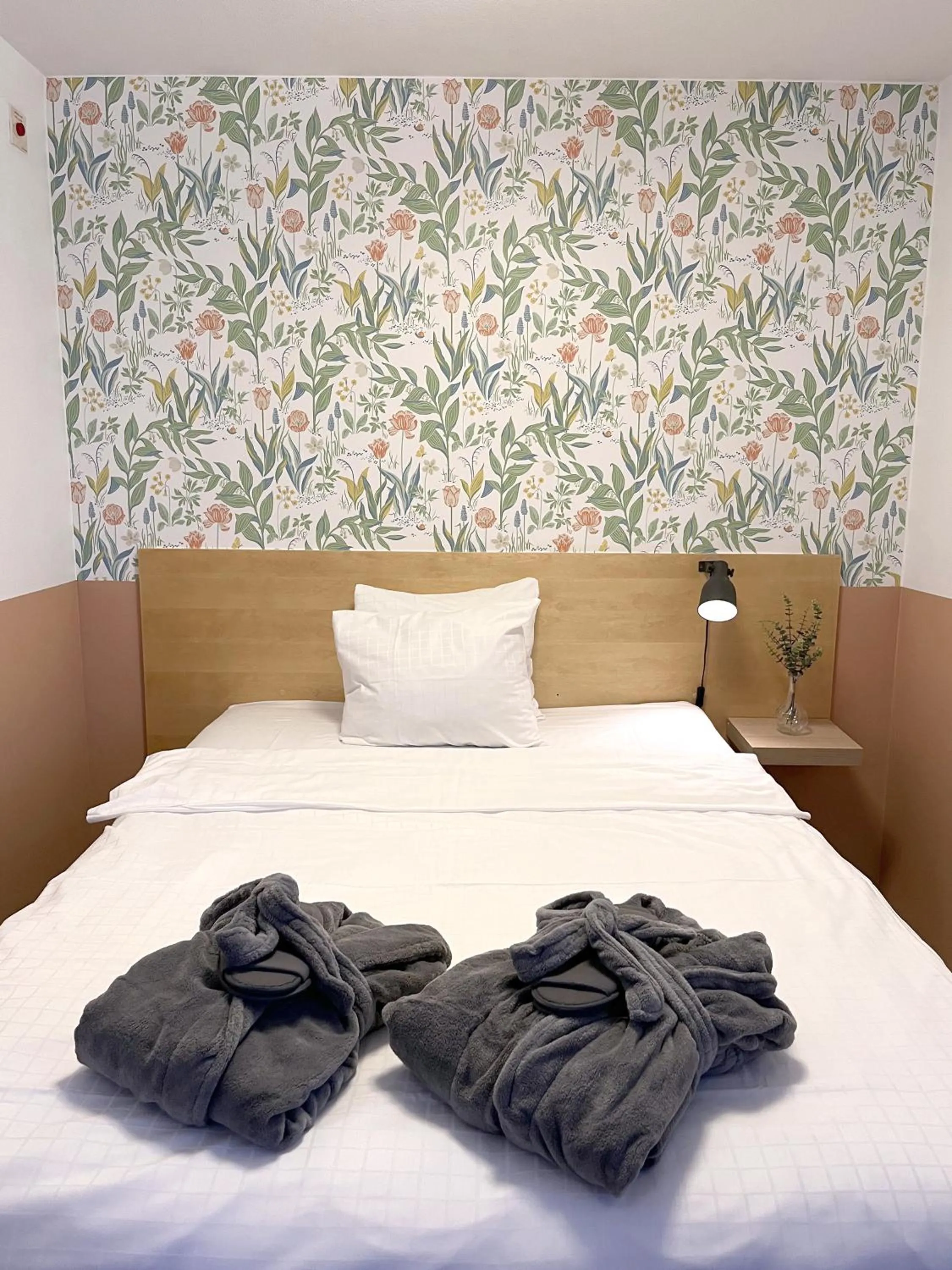 Bed in 2Home Hotel Apartments