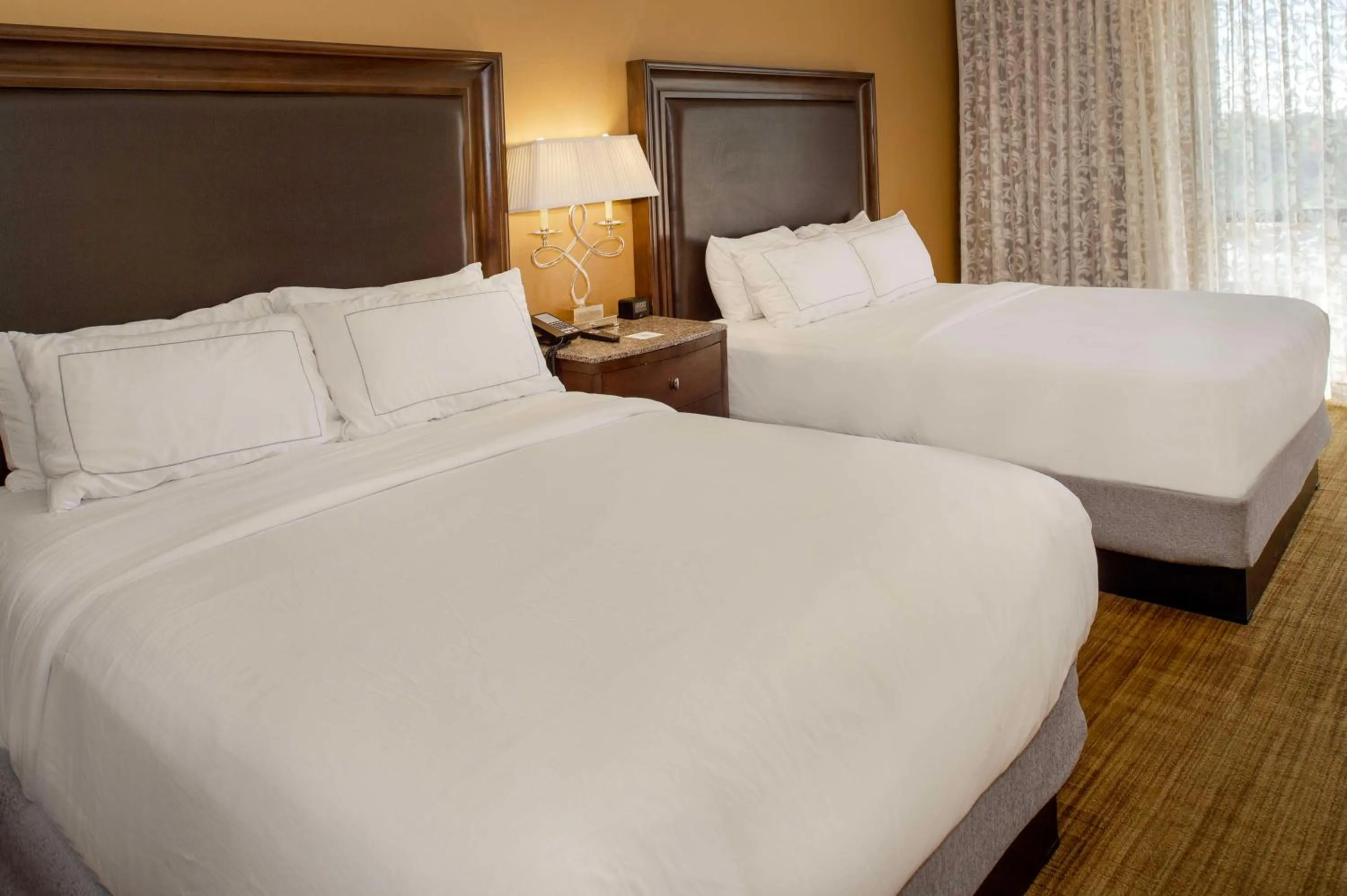 Bed in Hilton St. Louis Airport