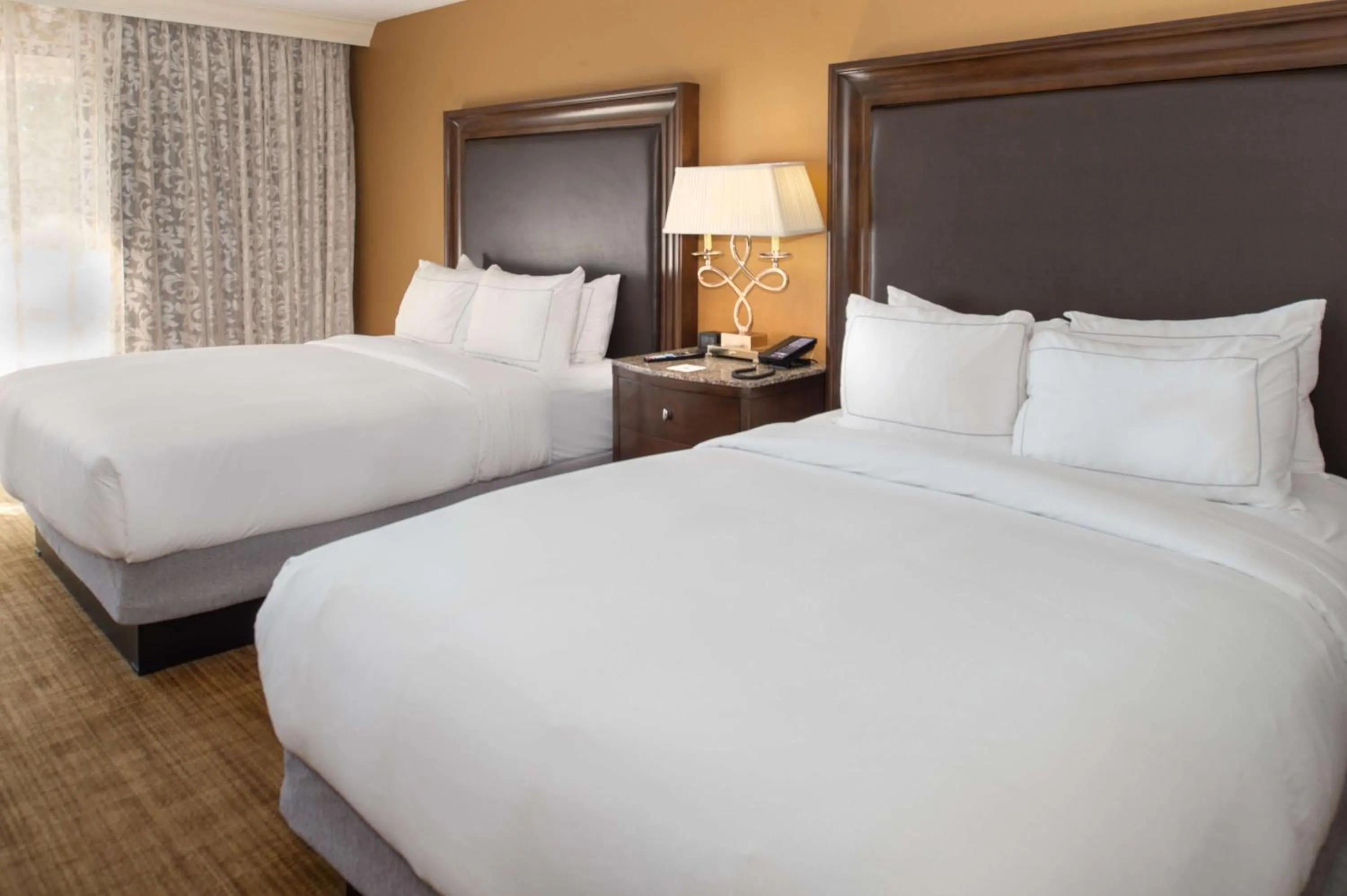 Bed in Hilton St. Louis Airport