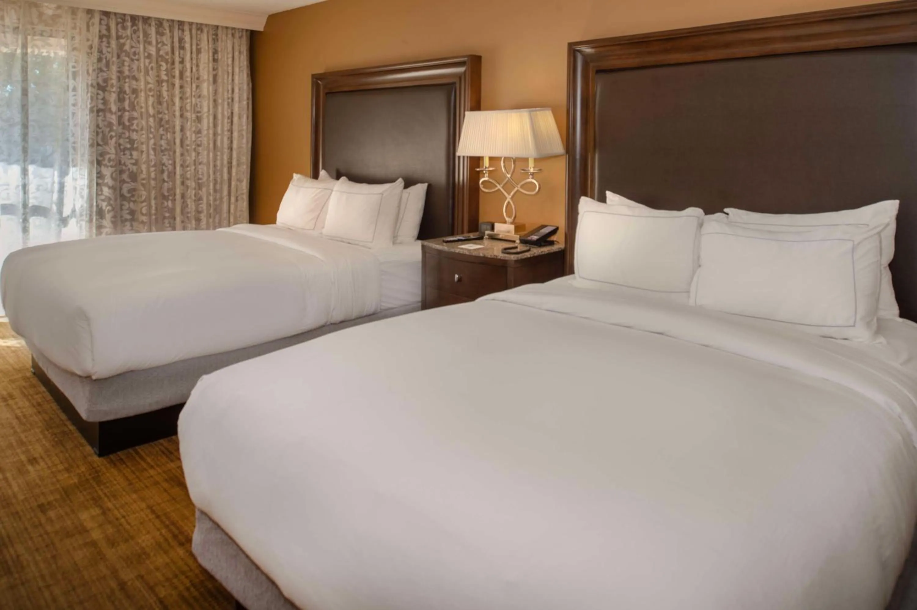 Bed in Hilton St. Louis Airport