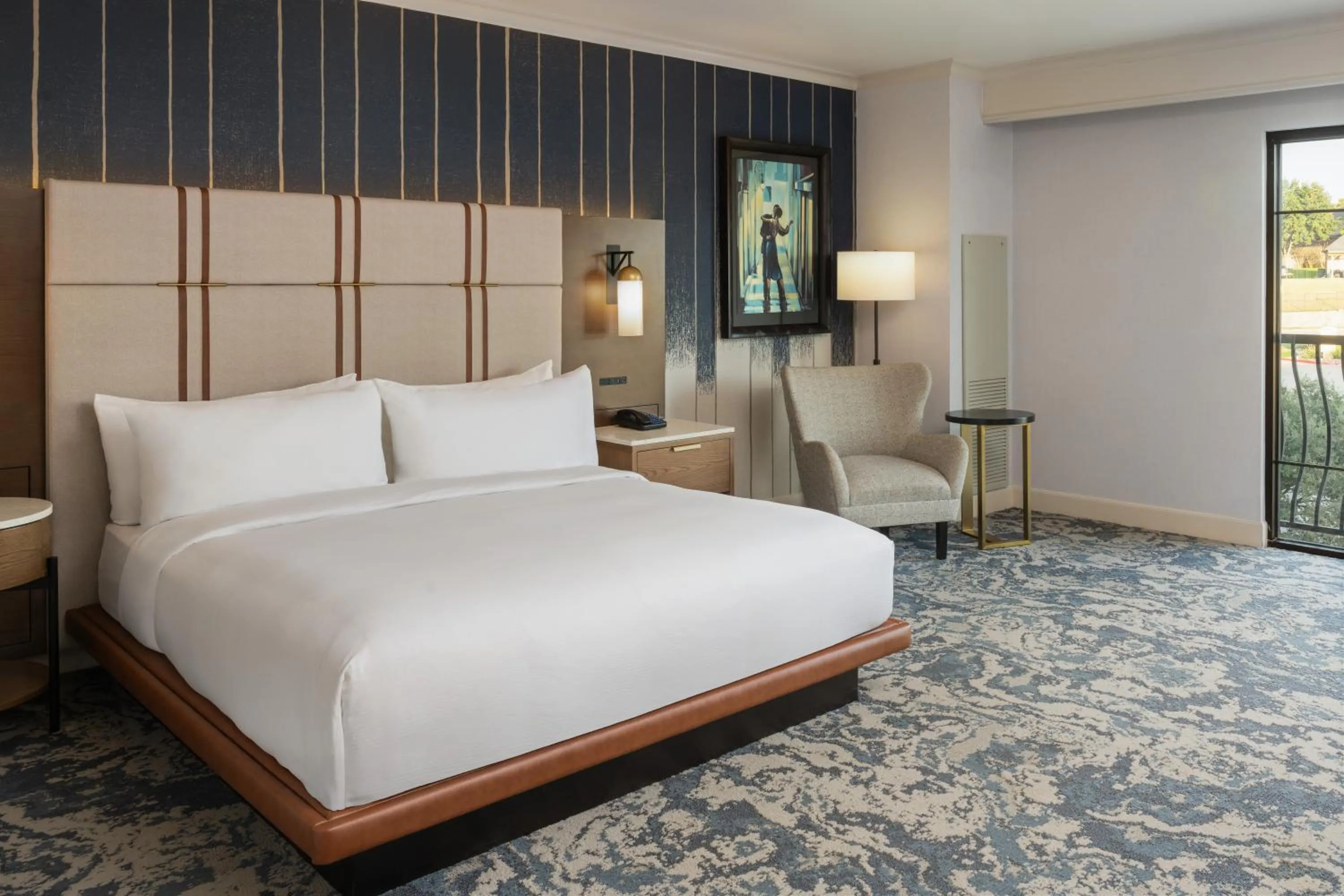 Bed in Hilton Dallas/Rockwall Lakefront Hotel