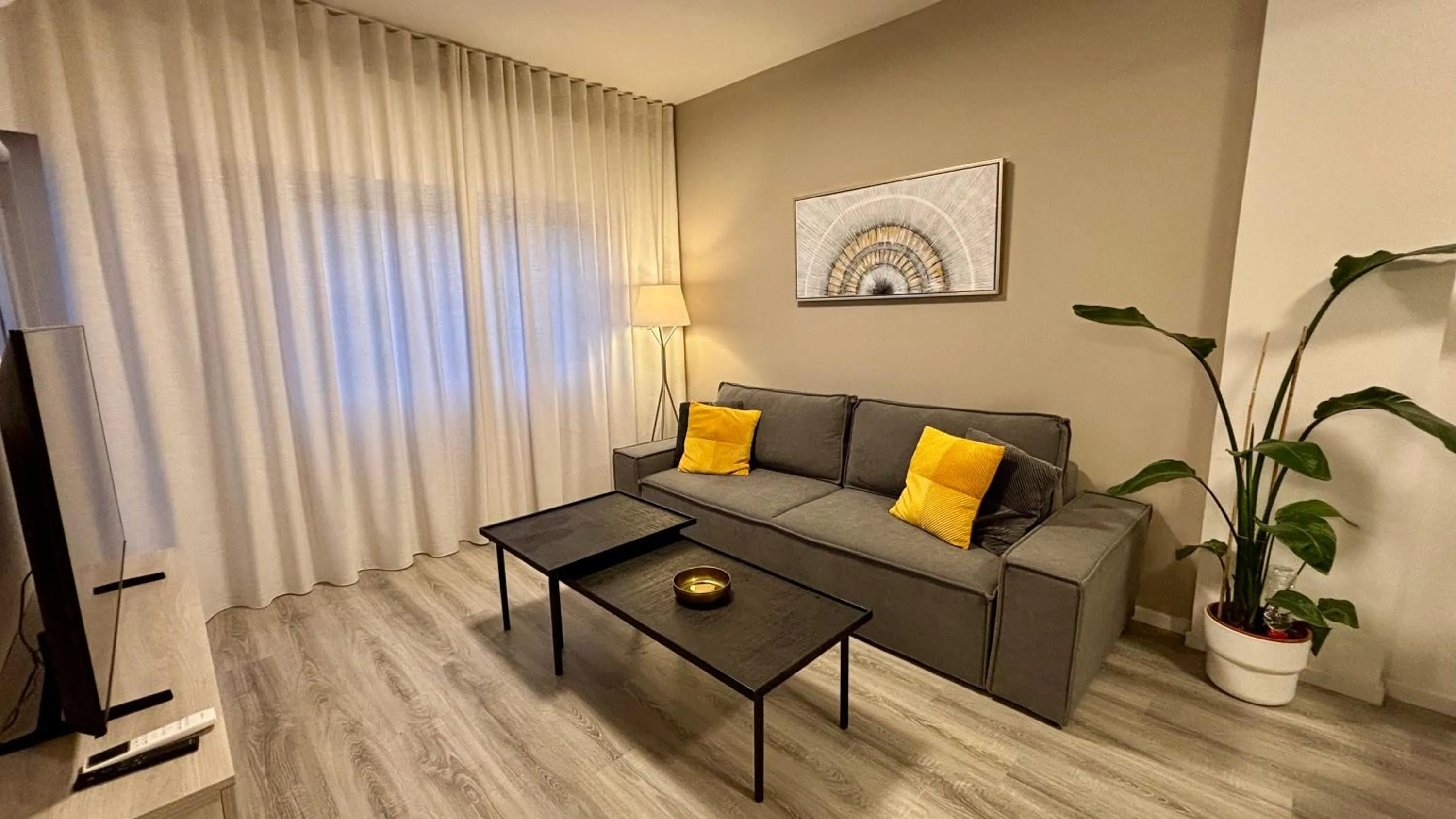 Living room in SeaBreeze City Center Flats by TrulyCyprus