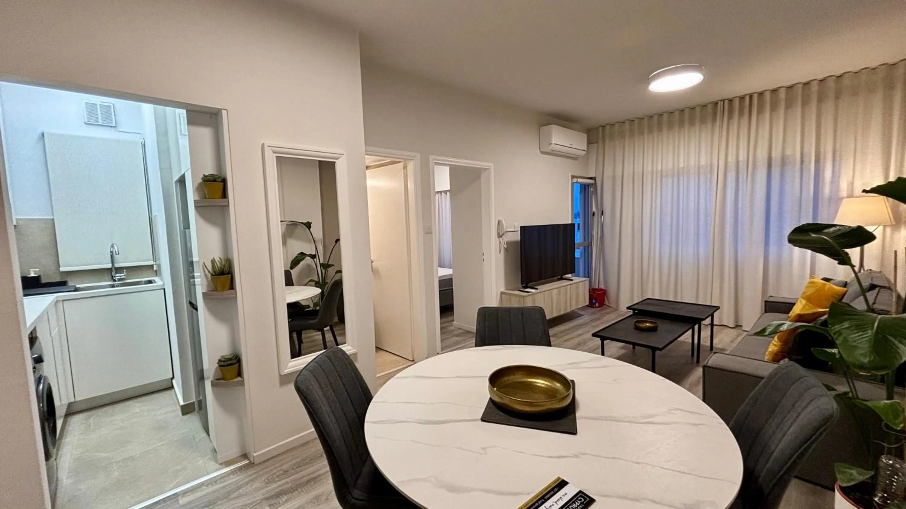 Living room in SeaBreeze City Center Flats by TrulyCyprus