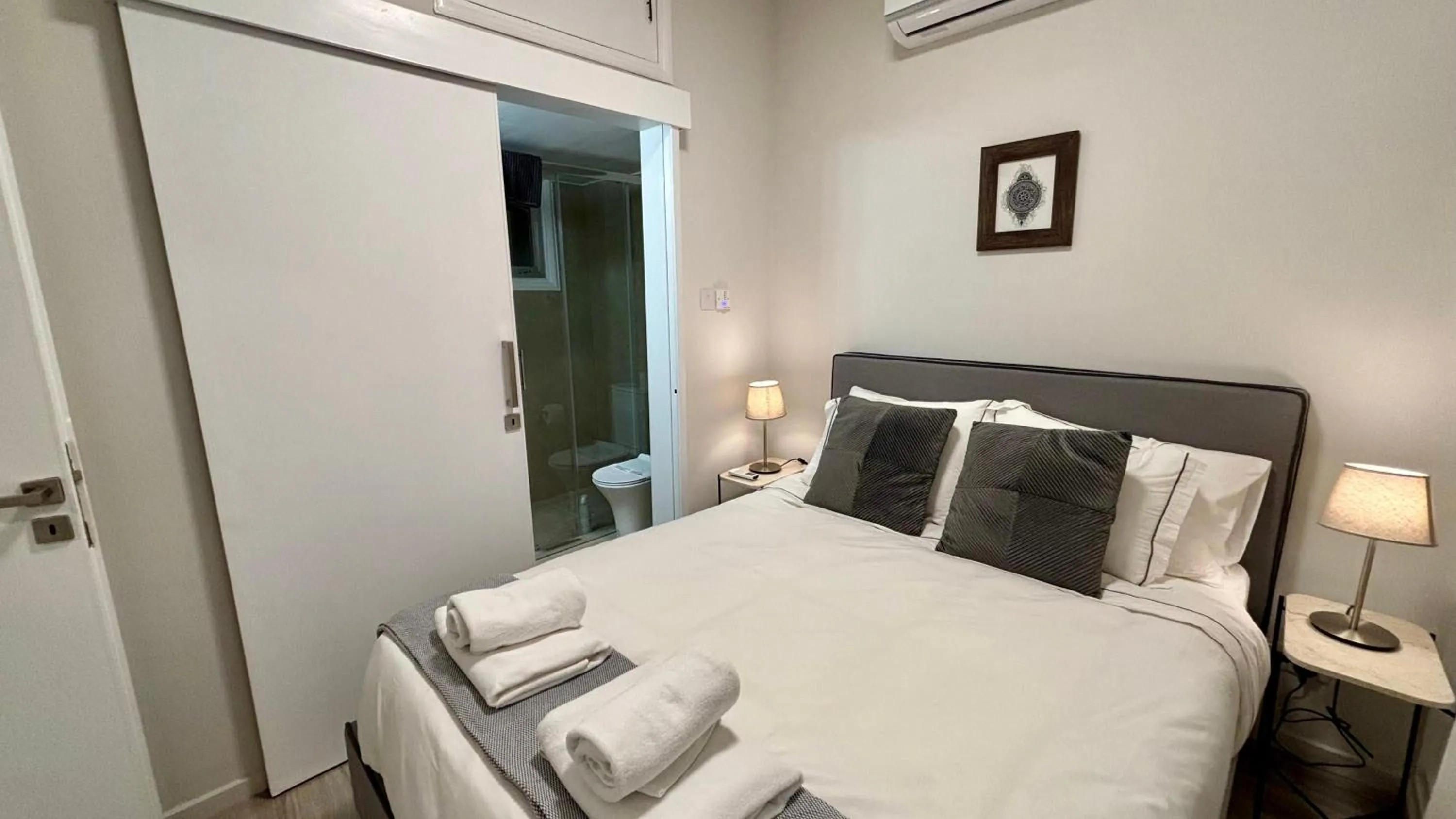 Bedroom, Bed in SeaBreeze City Center Flats by TrulyCyprus