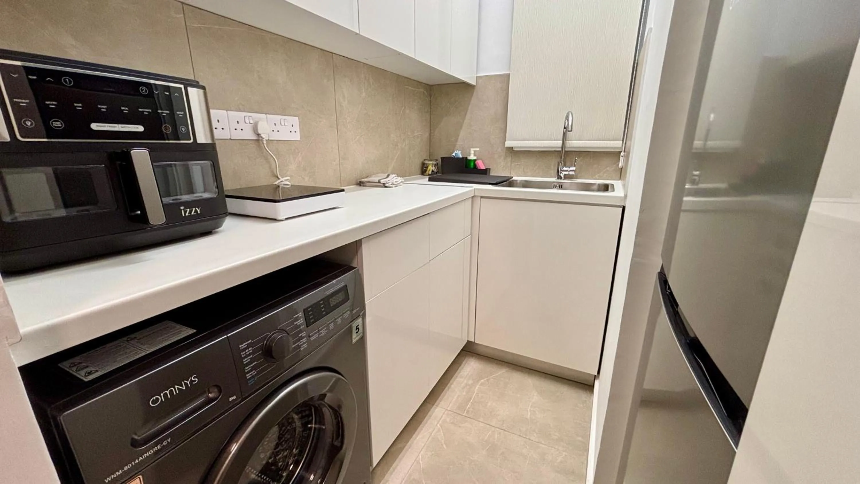 Kitchen or kitchenette in SeaBreeze City Center Flats by TrulyCyprus