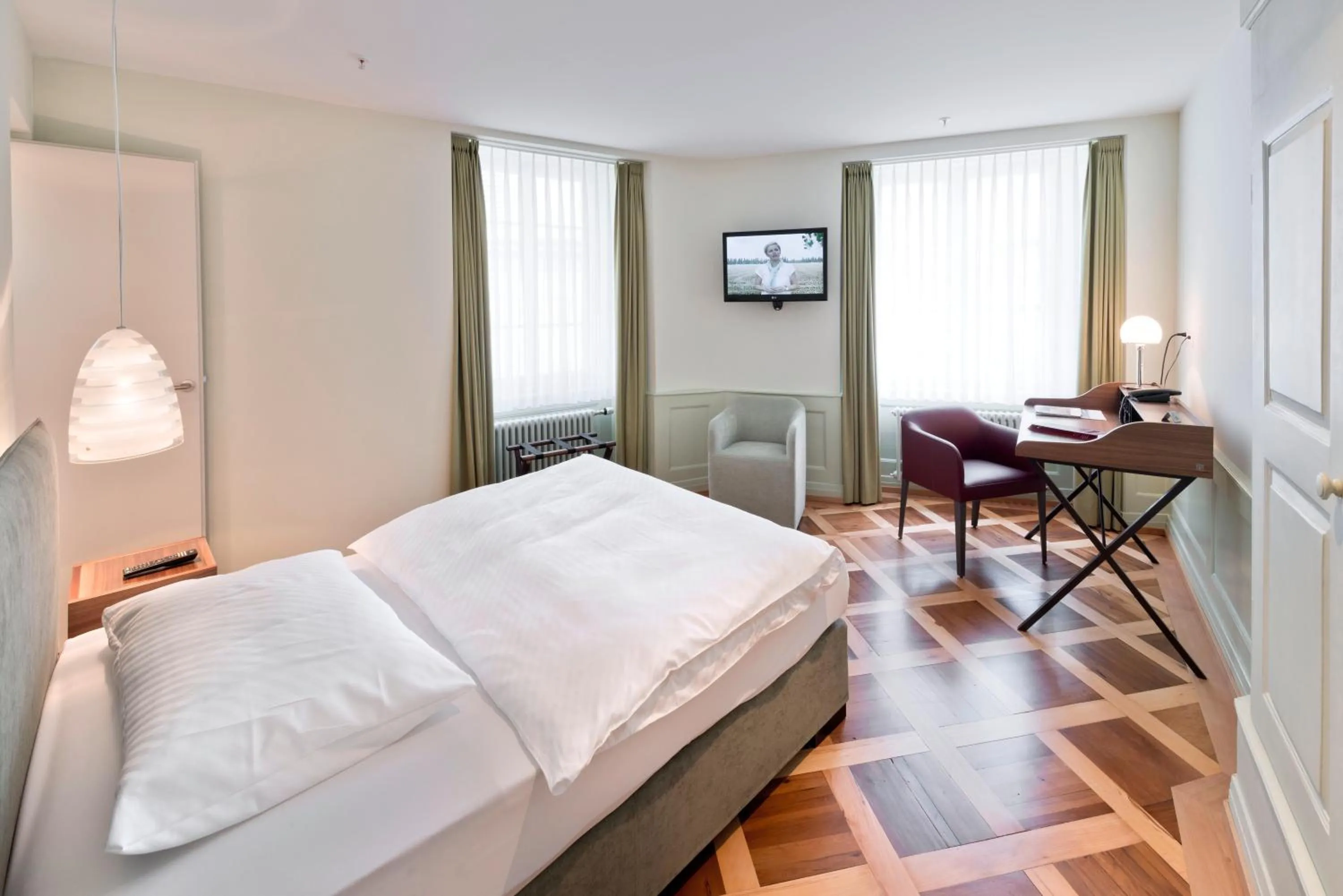 Bed in BLUME Baden Hotel & Restaurant