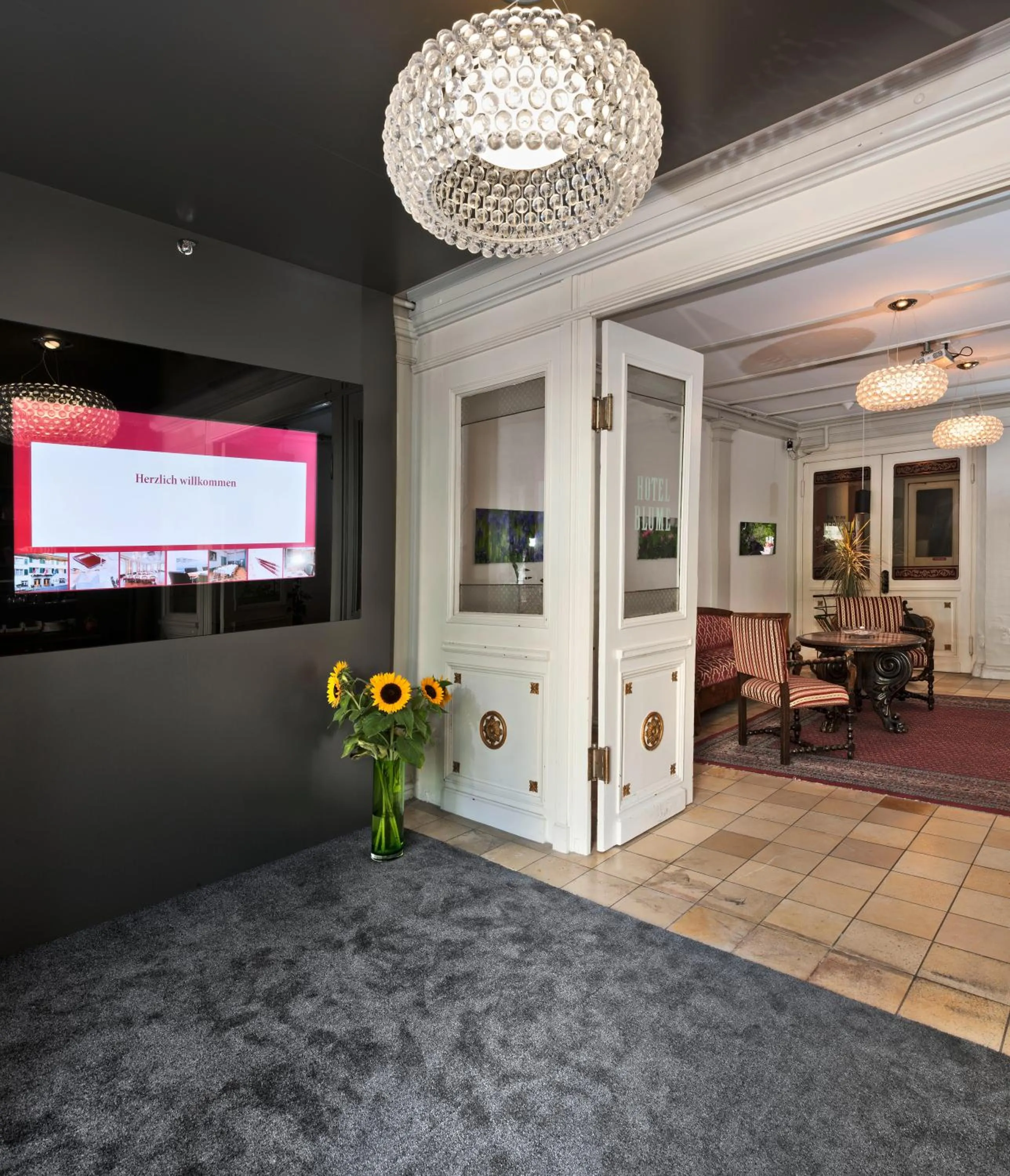 Lobby or reception in BLUME Baden Hotel & Restaurant