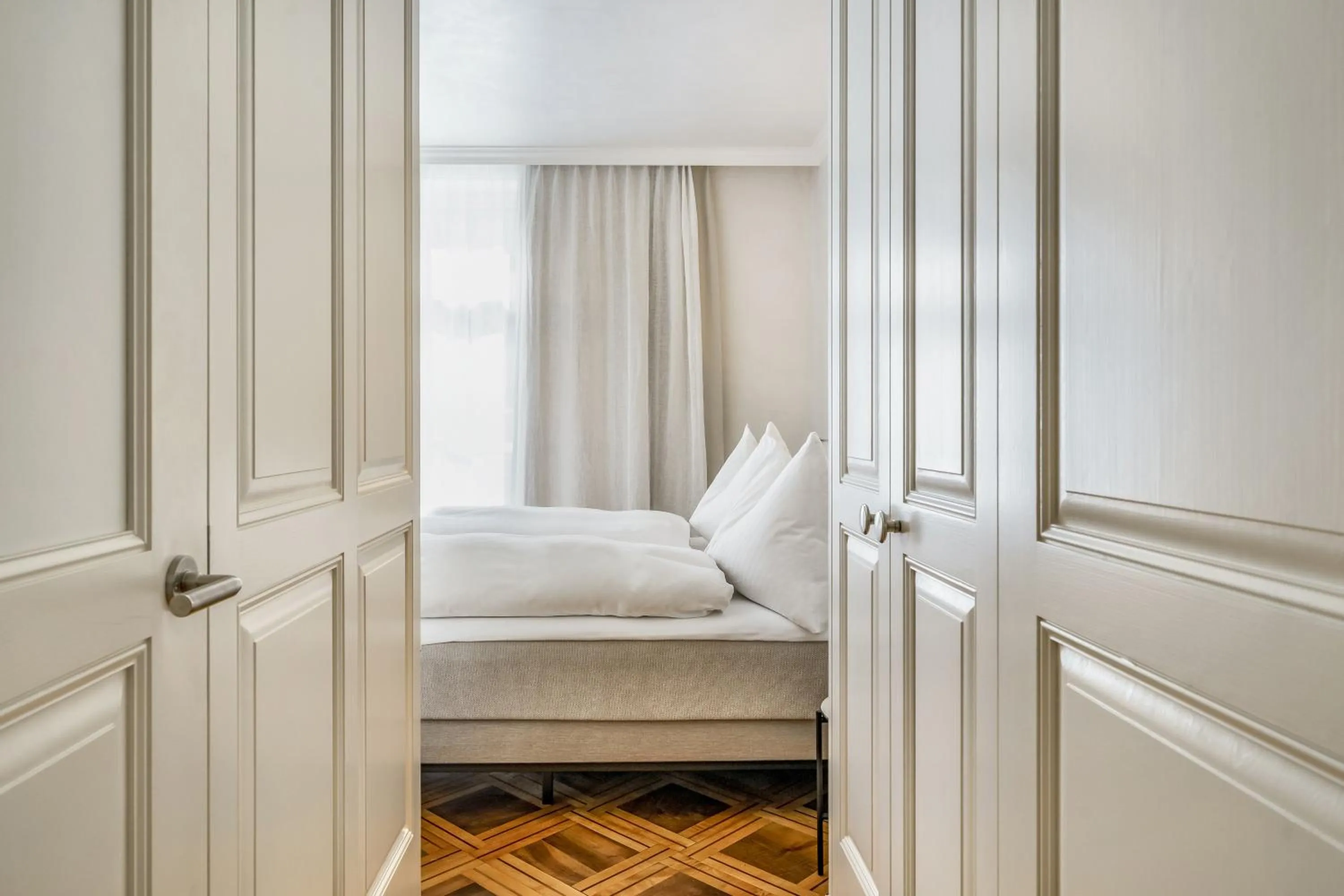 Bed in BLUME Baden Hotel & Restaurant