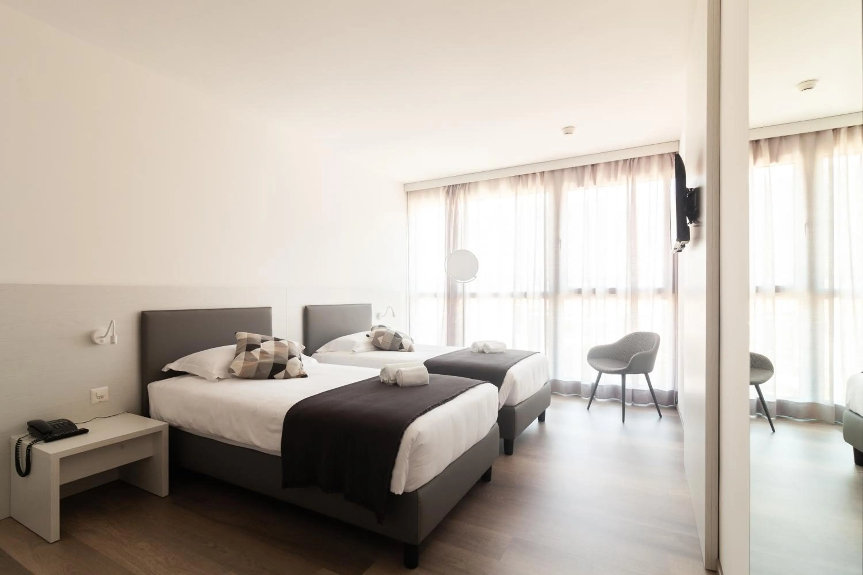 Photo of the whole room, Bed in Hotel Albergo Milano