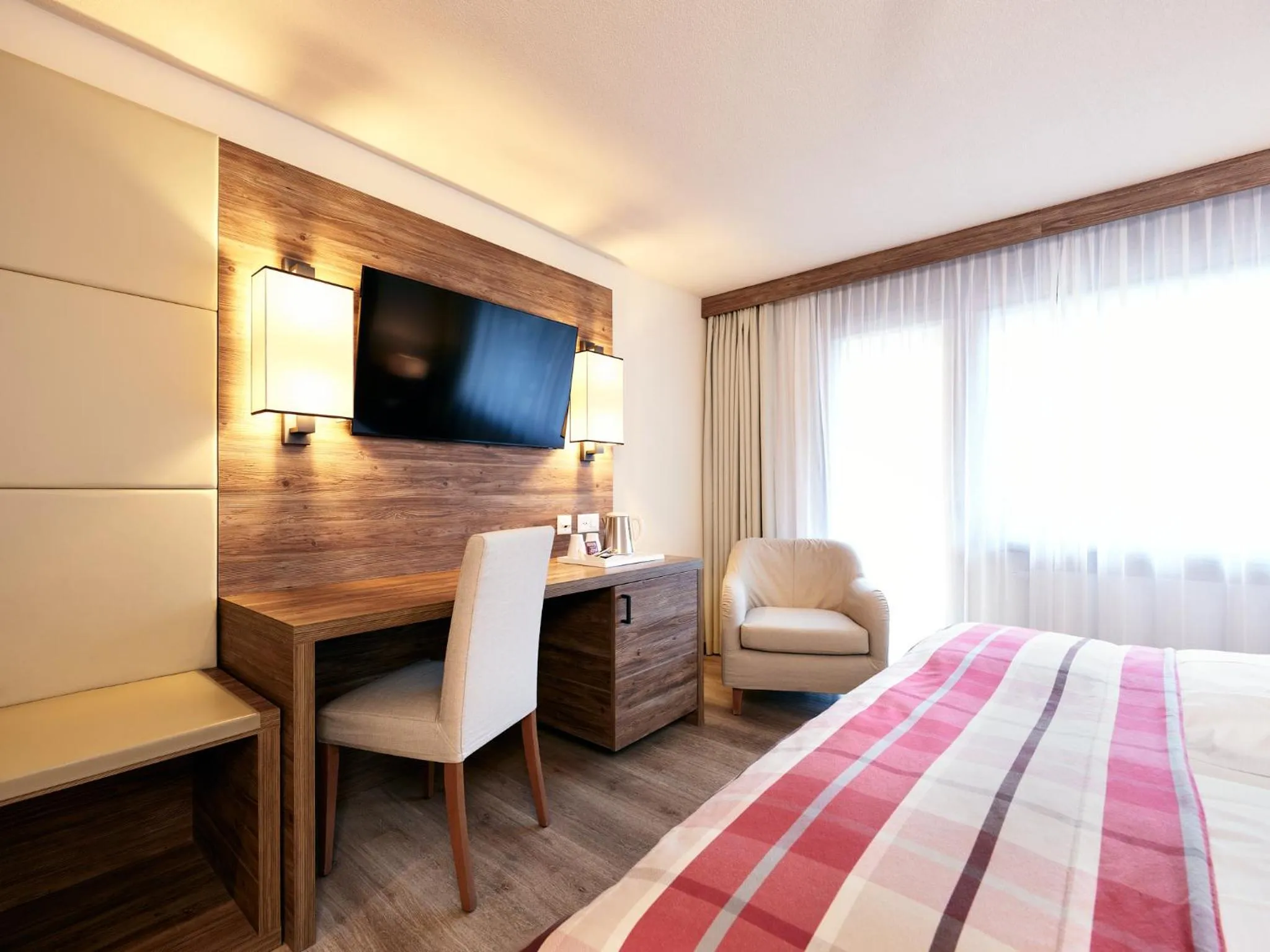 Bedroom, Bed in Hotel Ambassador Zermatt