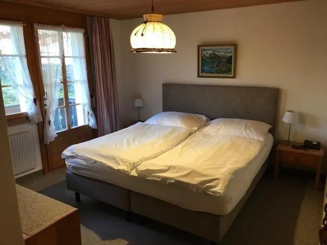 Bed in Hotel Châlet Du Lac