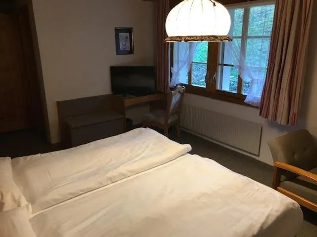 Bed in Hotel Châlet Du Lac