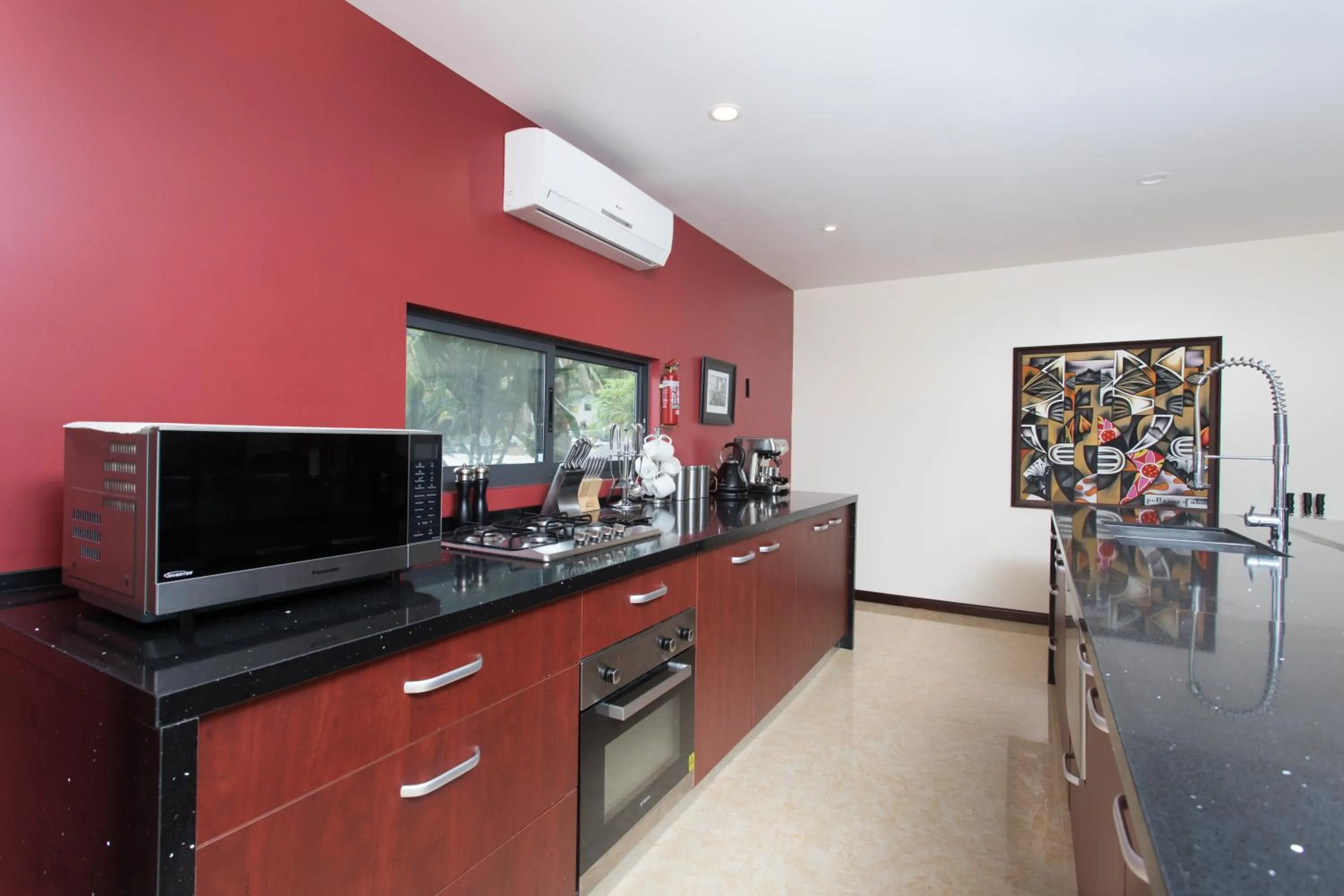 Kitchen or kitchenette in Kia Orana Villas and Spa