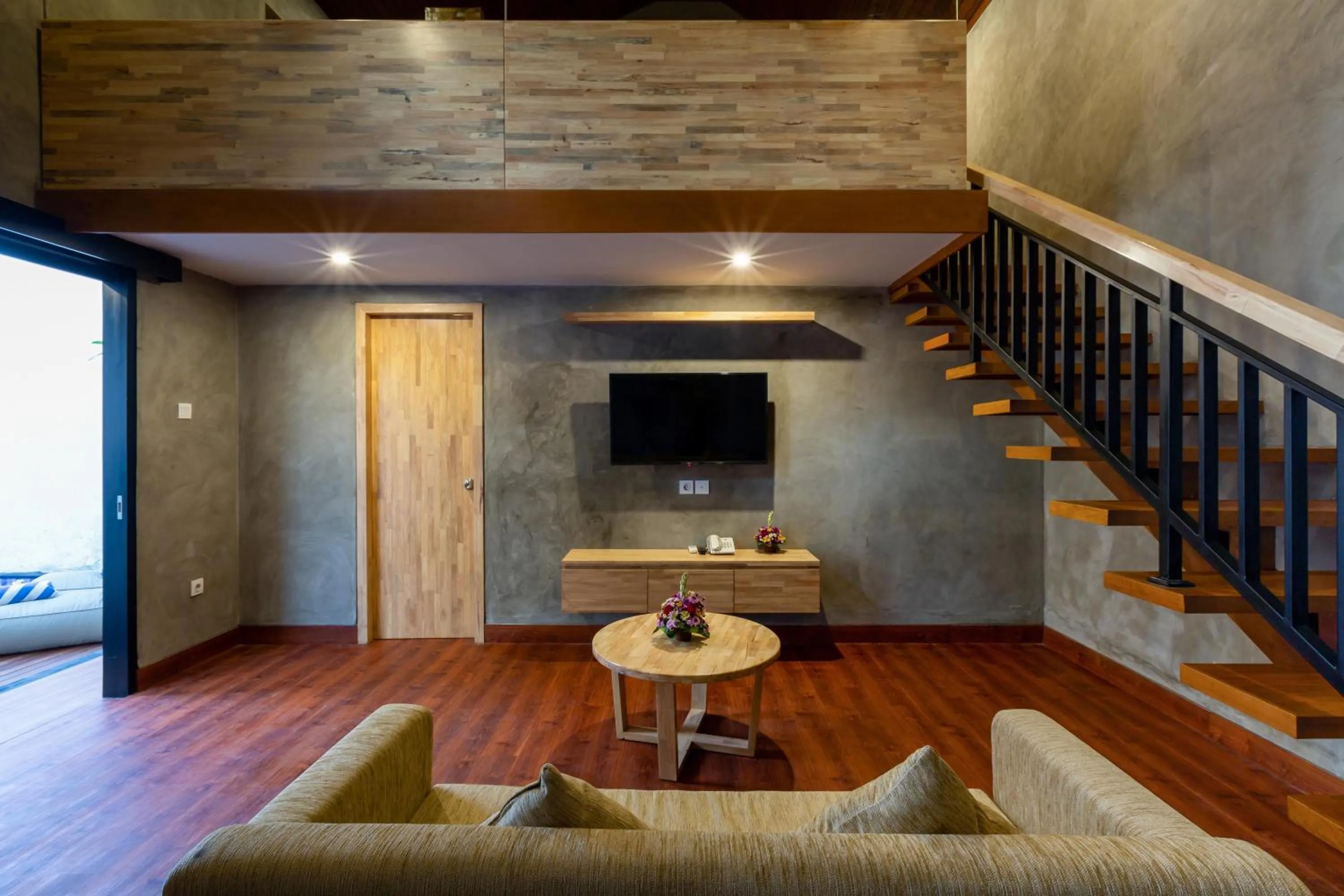 Communal lounge/ TV room in Paisa Villa Seminyak