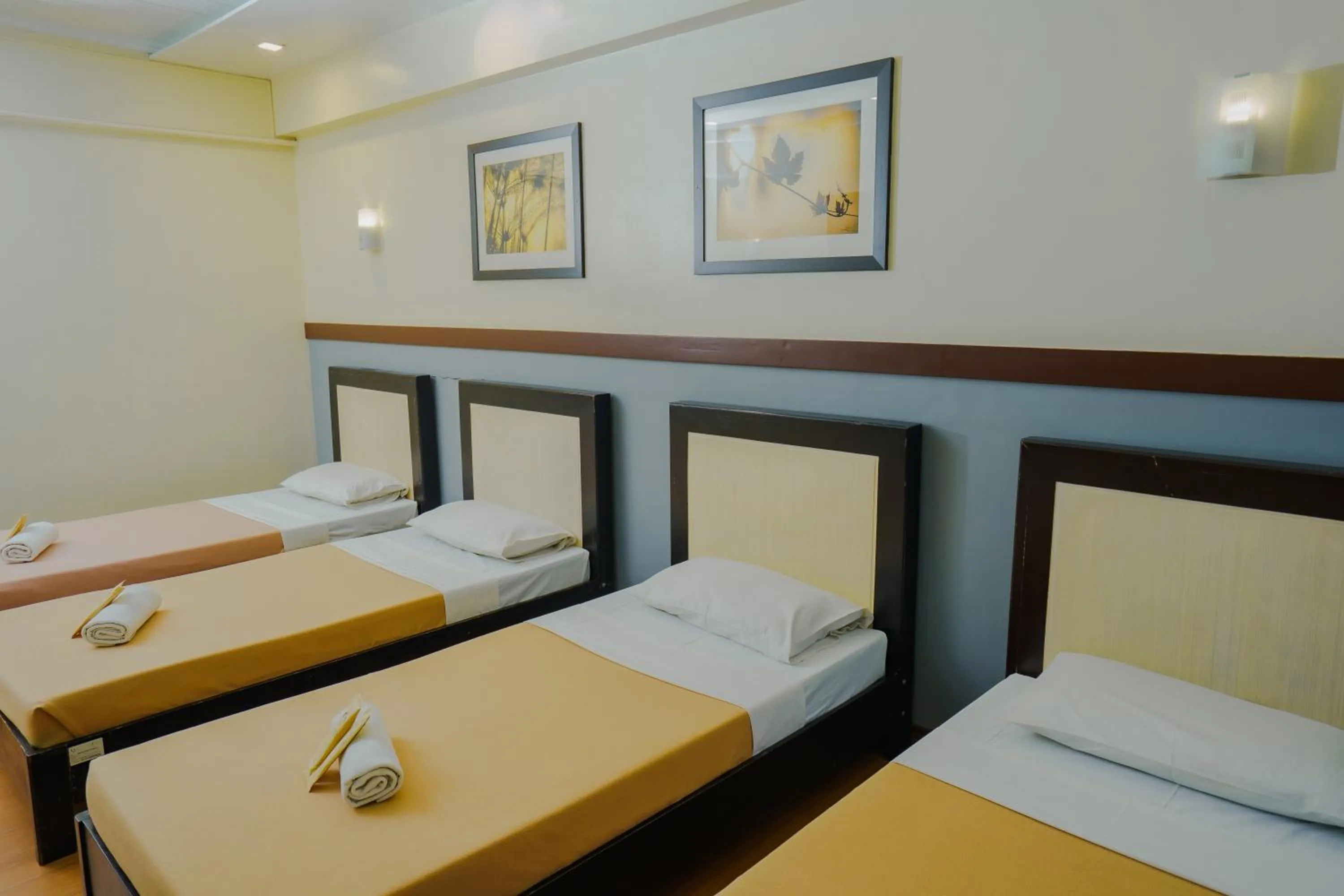 Bed in Venus Parkview Hotel