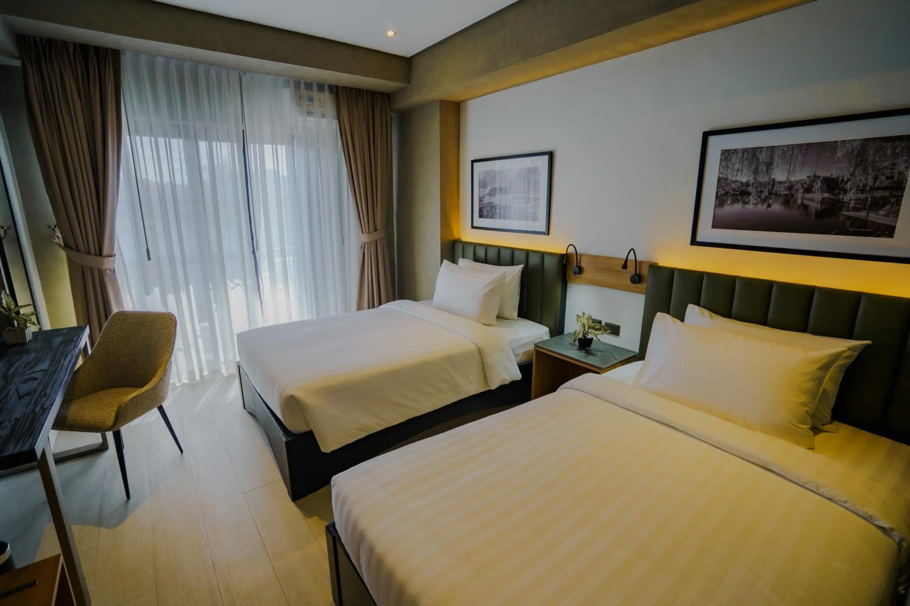 Bed in Venus Parkview Hotel