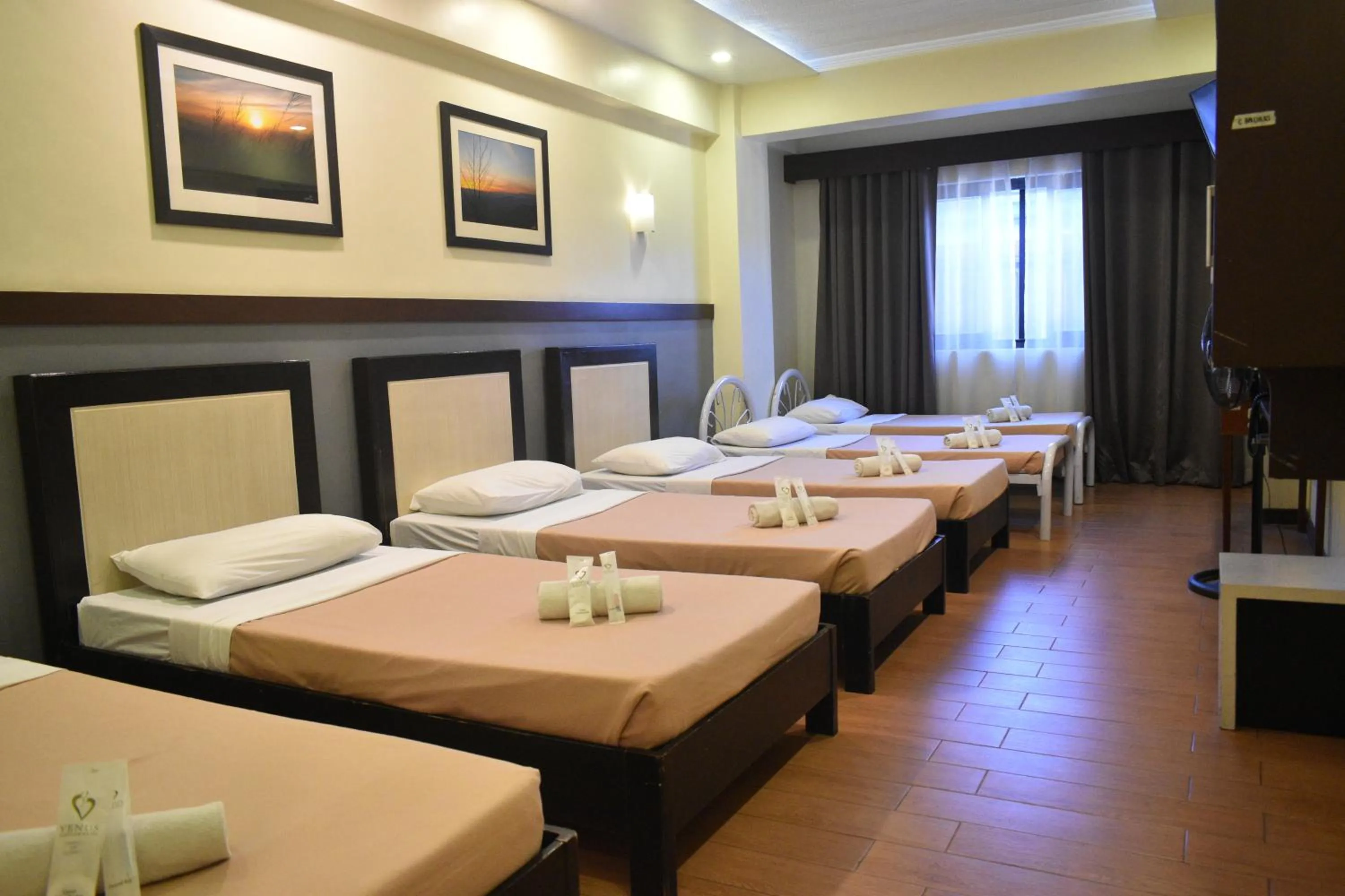 Bed in Venus Parkview Hotel