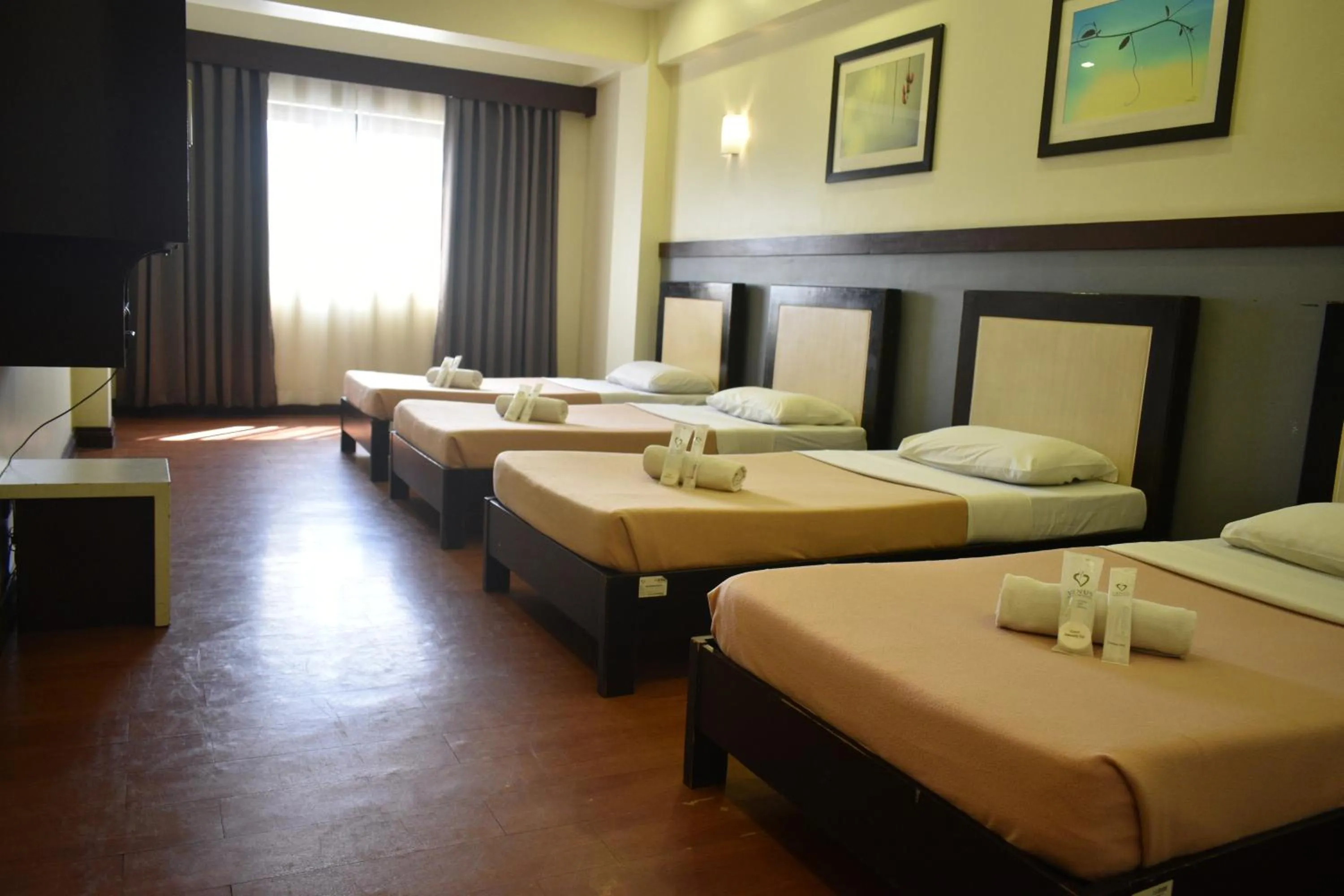 Bed in Venus Parkview Hotel