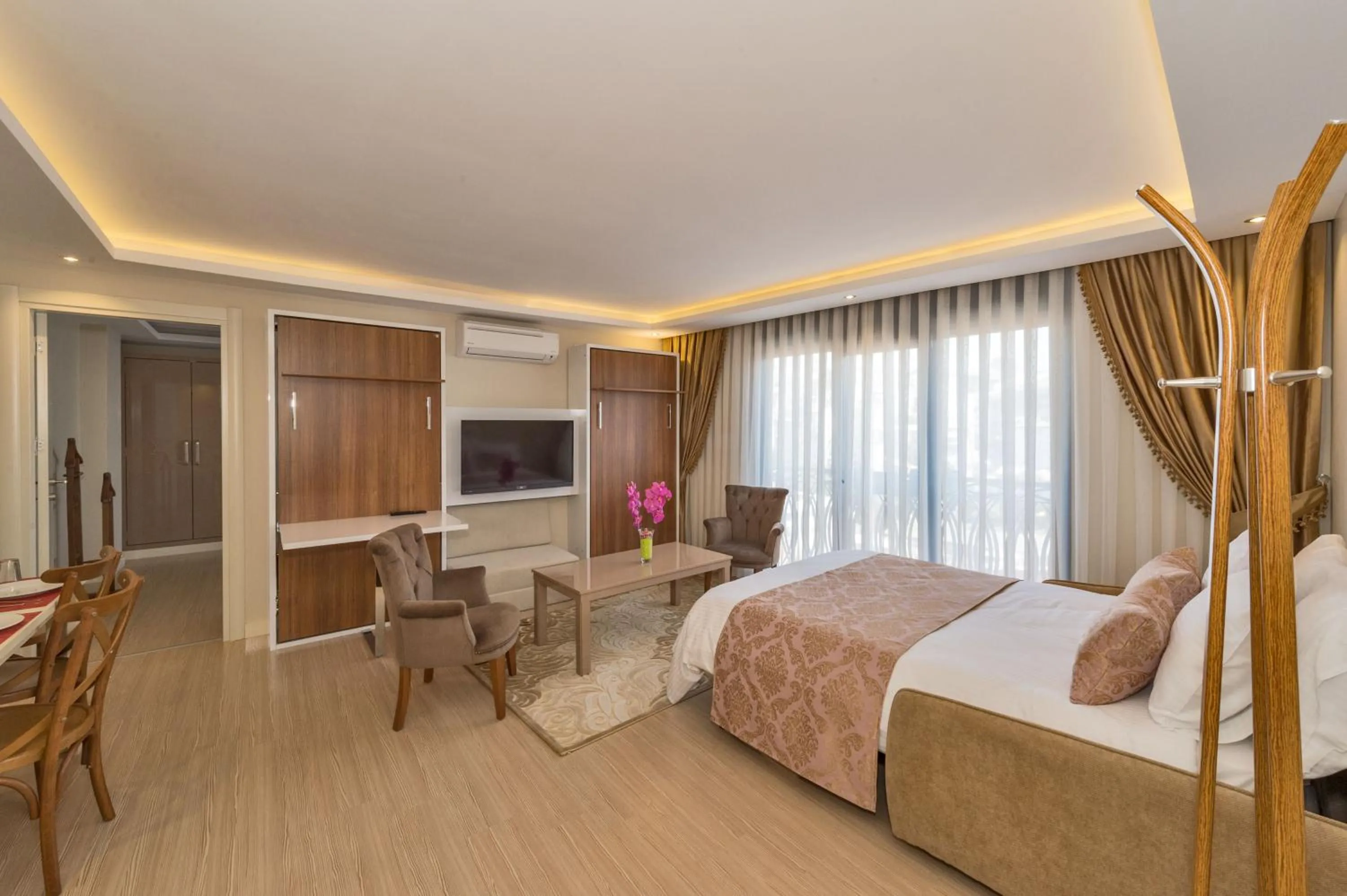 Living room, Bed in Gen Suites