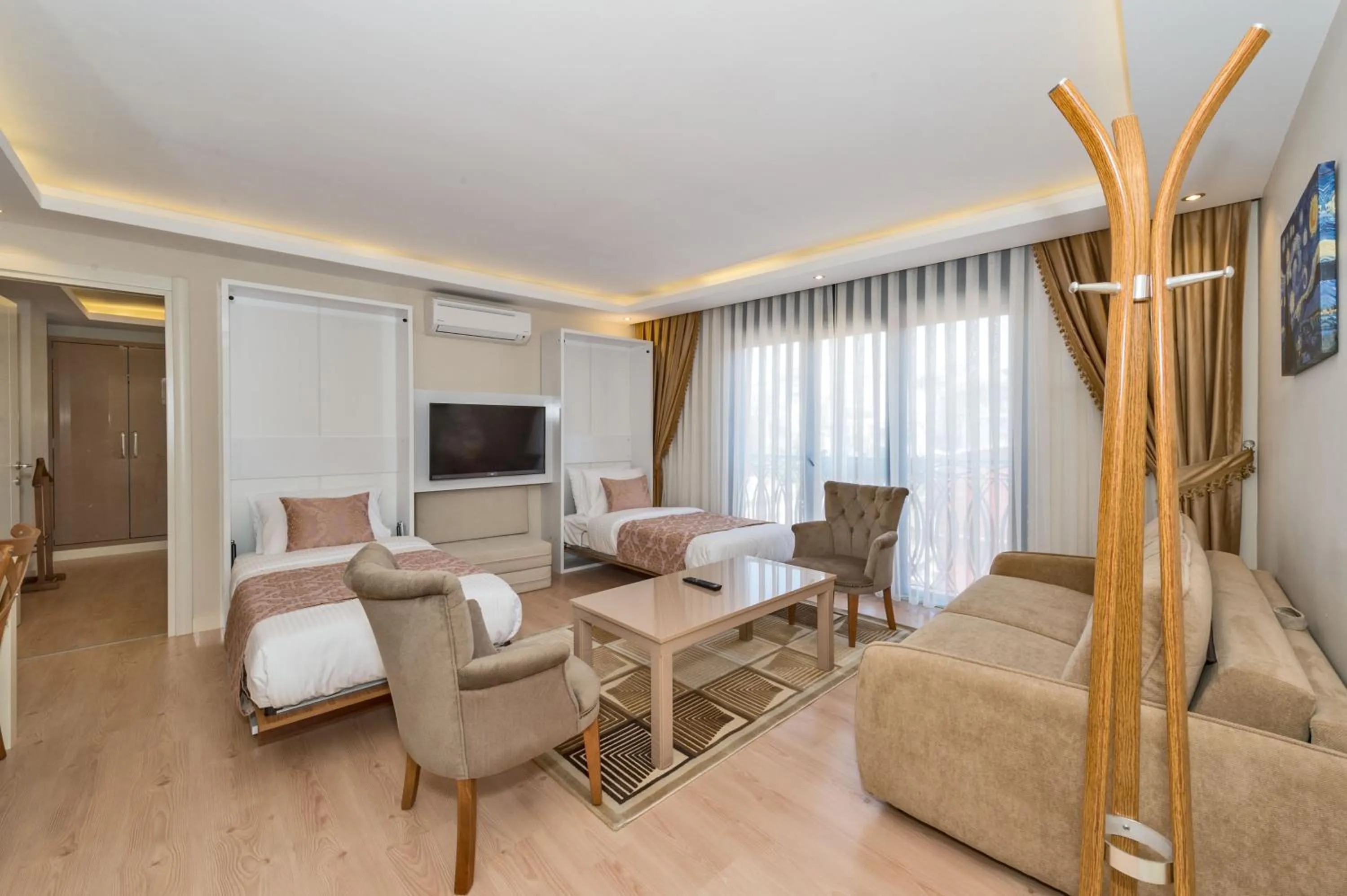 Living room, Bed in Gen Suites