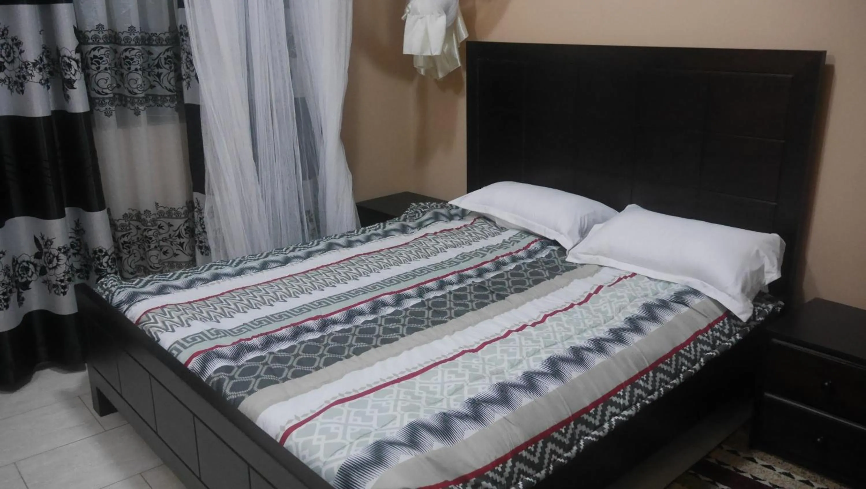 Bed in Ntinda View Apartments