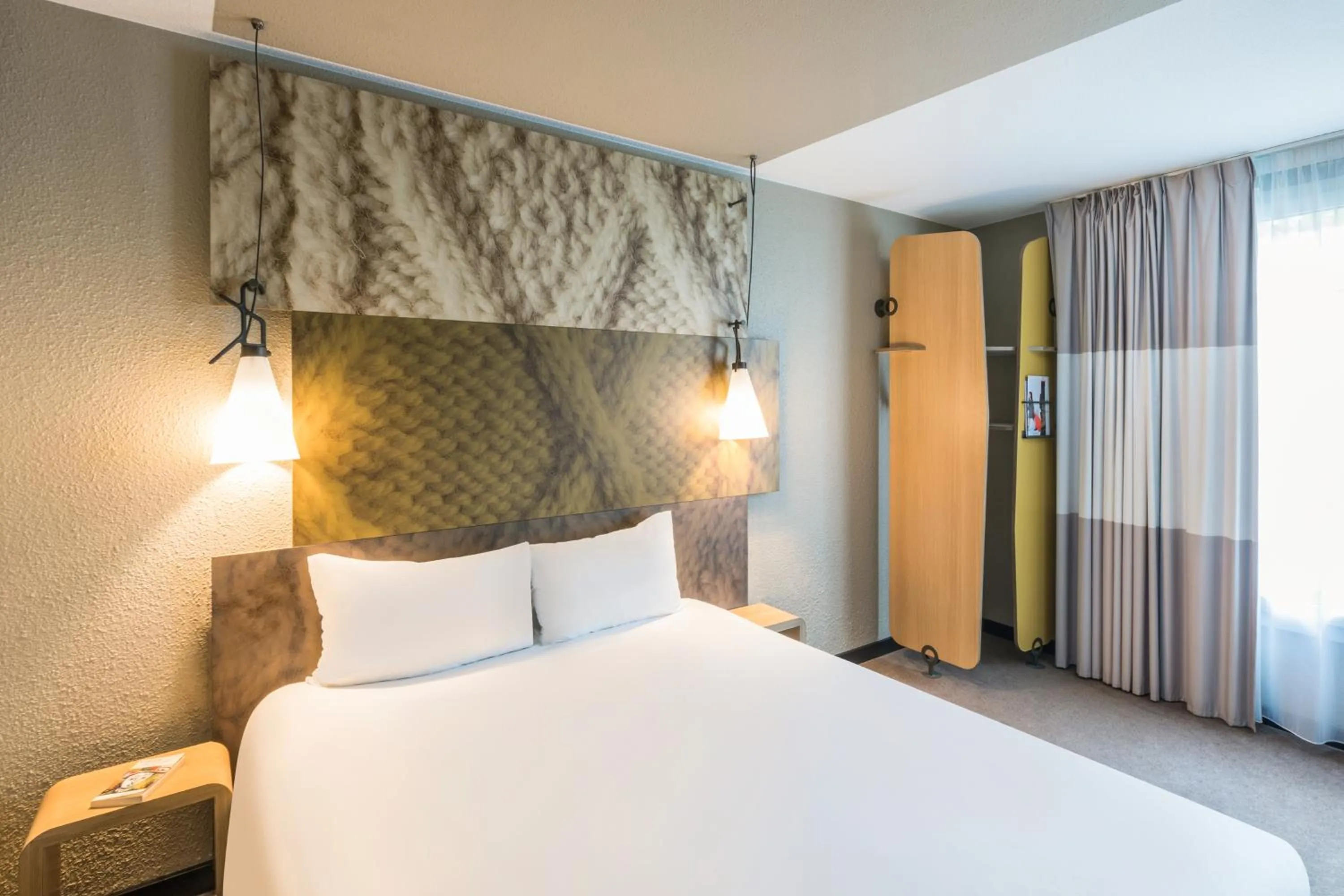 Decorative detail, Bed in ibis Zürich Messe Airport