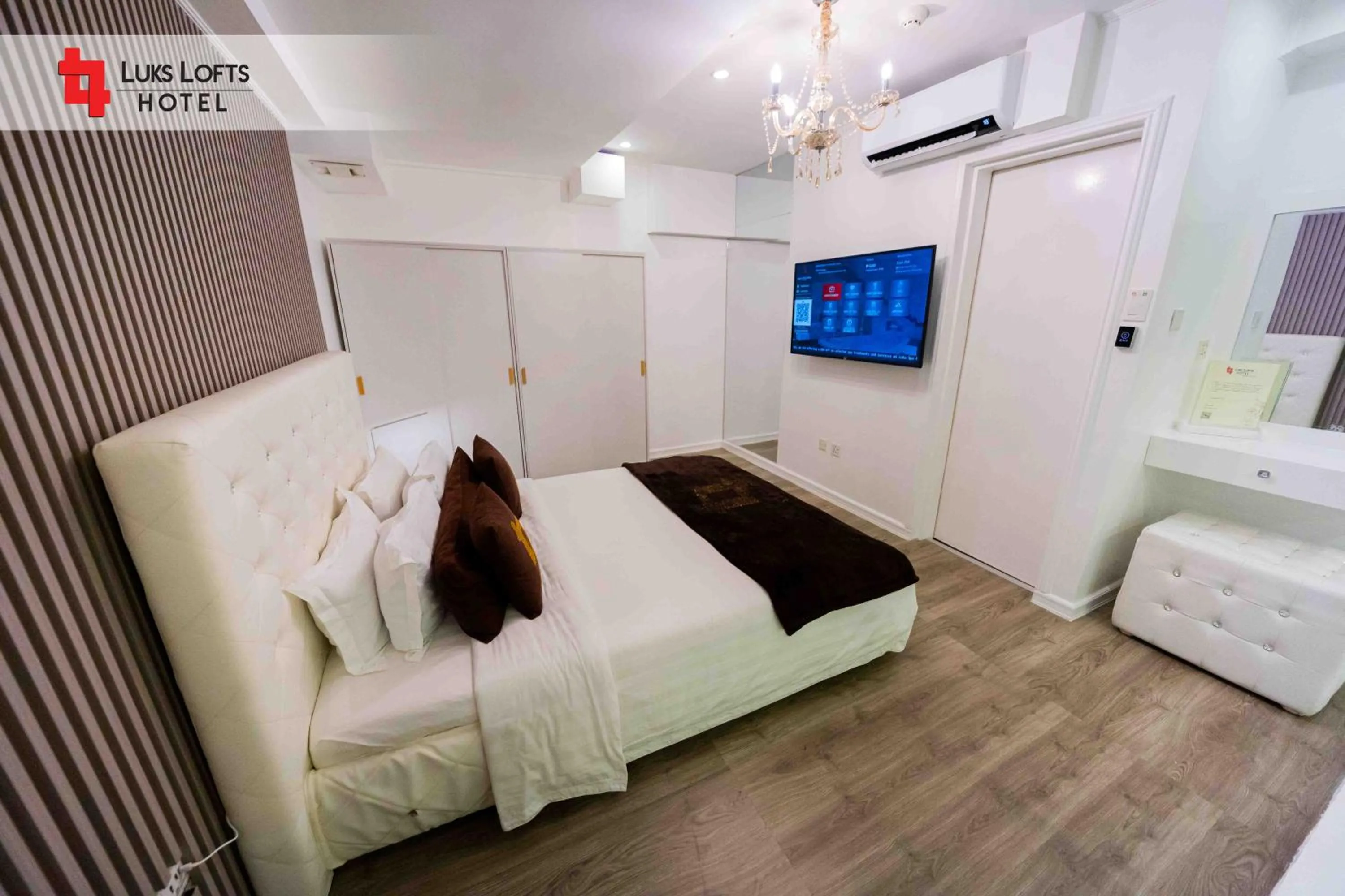 Bed in Luks Lofts Hotel & Residences