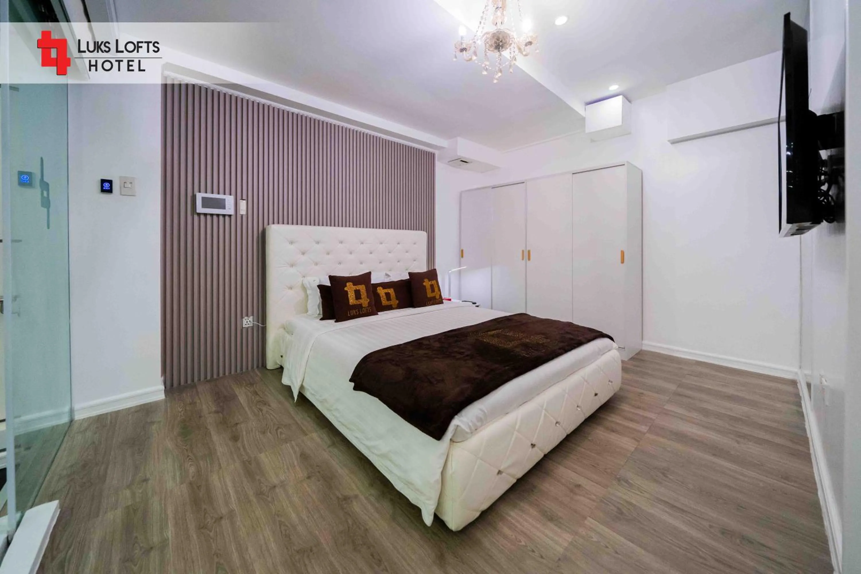 Bed in Luks Lofts Hotel & Residences