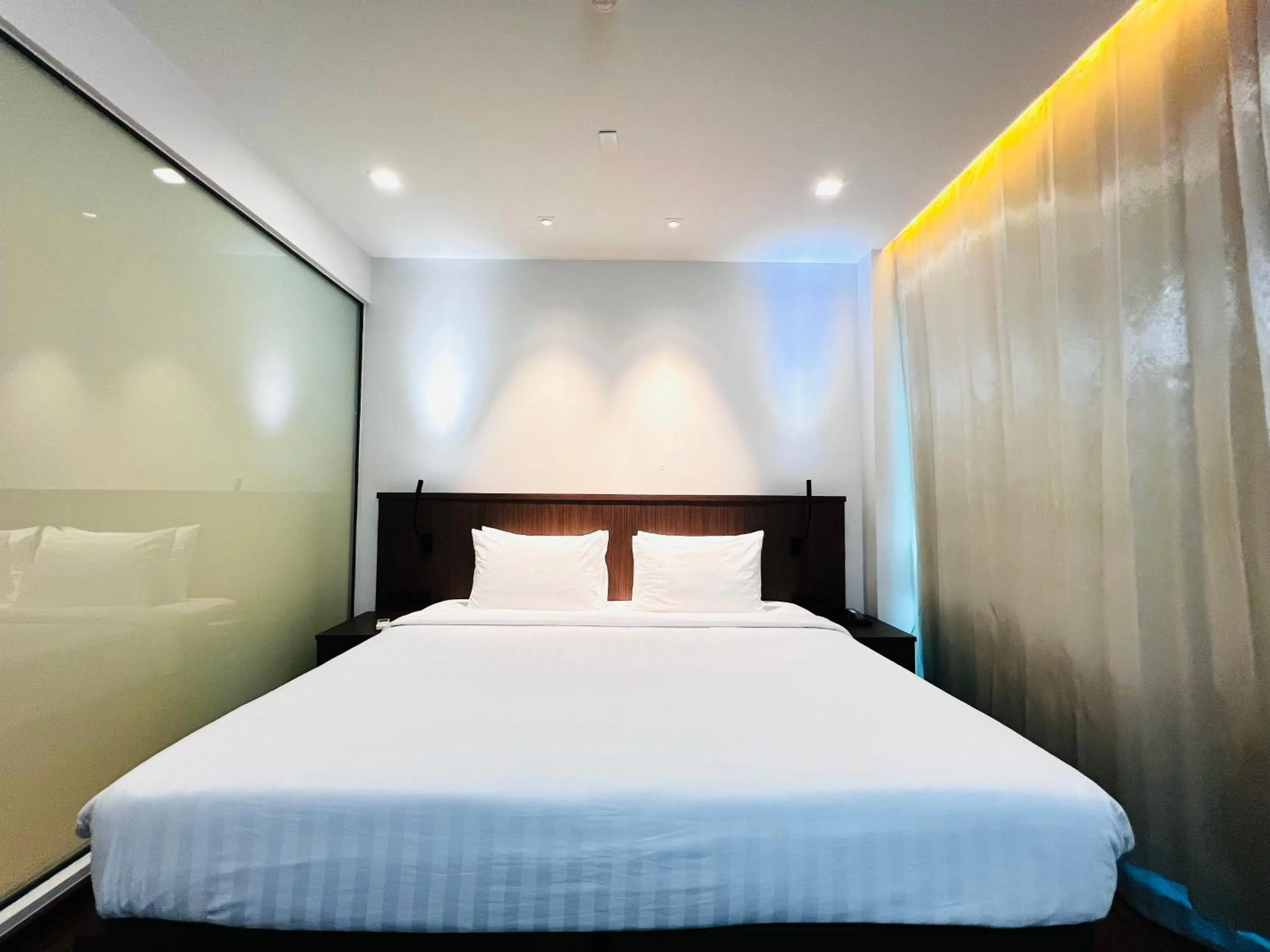 Bed in Civic Horizon Hotel & Residence