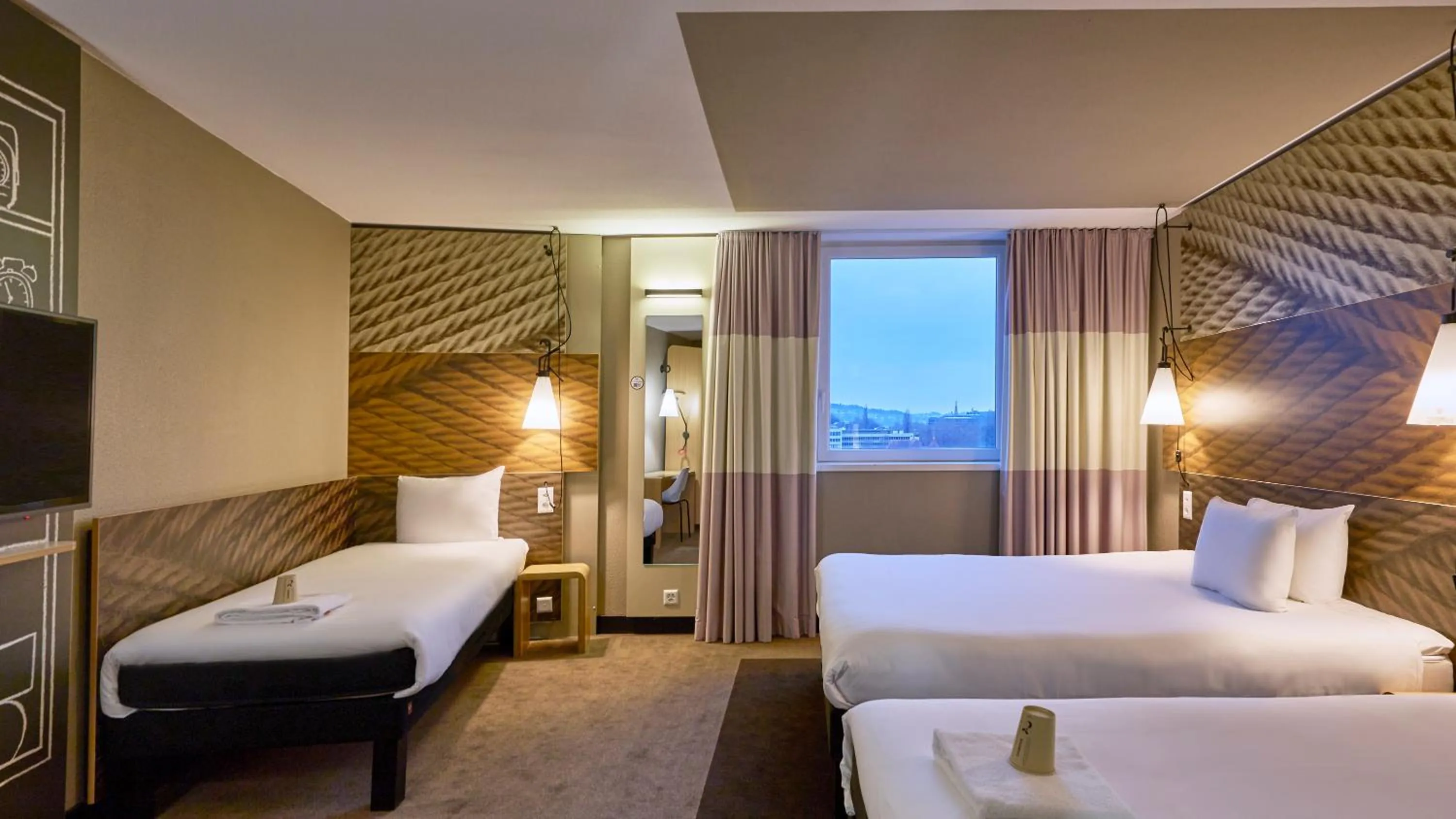 Living room, Bed in ibis Bern Expo