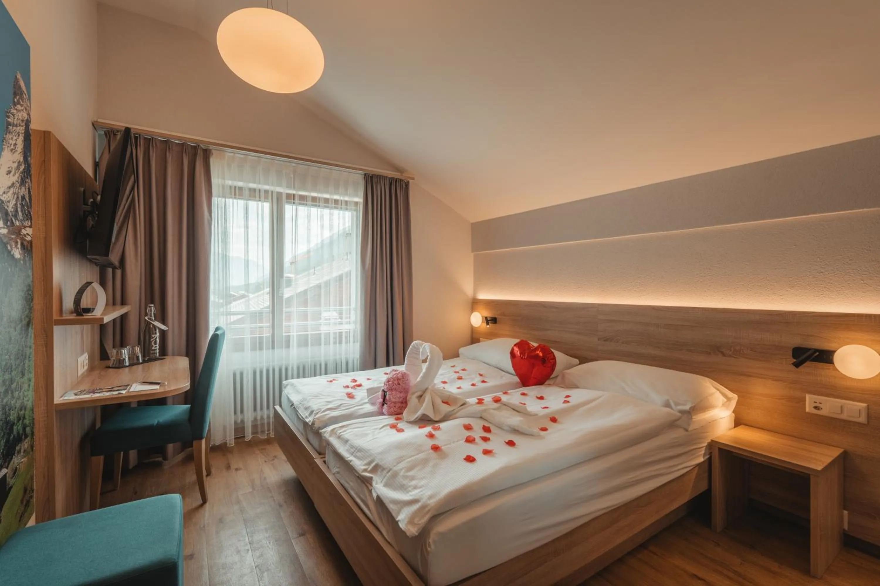 Bed in Hotel Matterhorn Inn