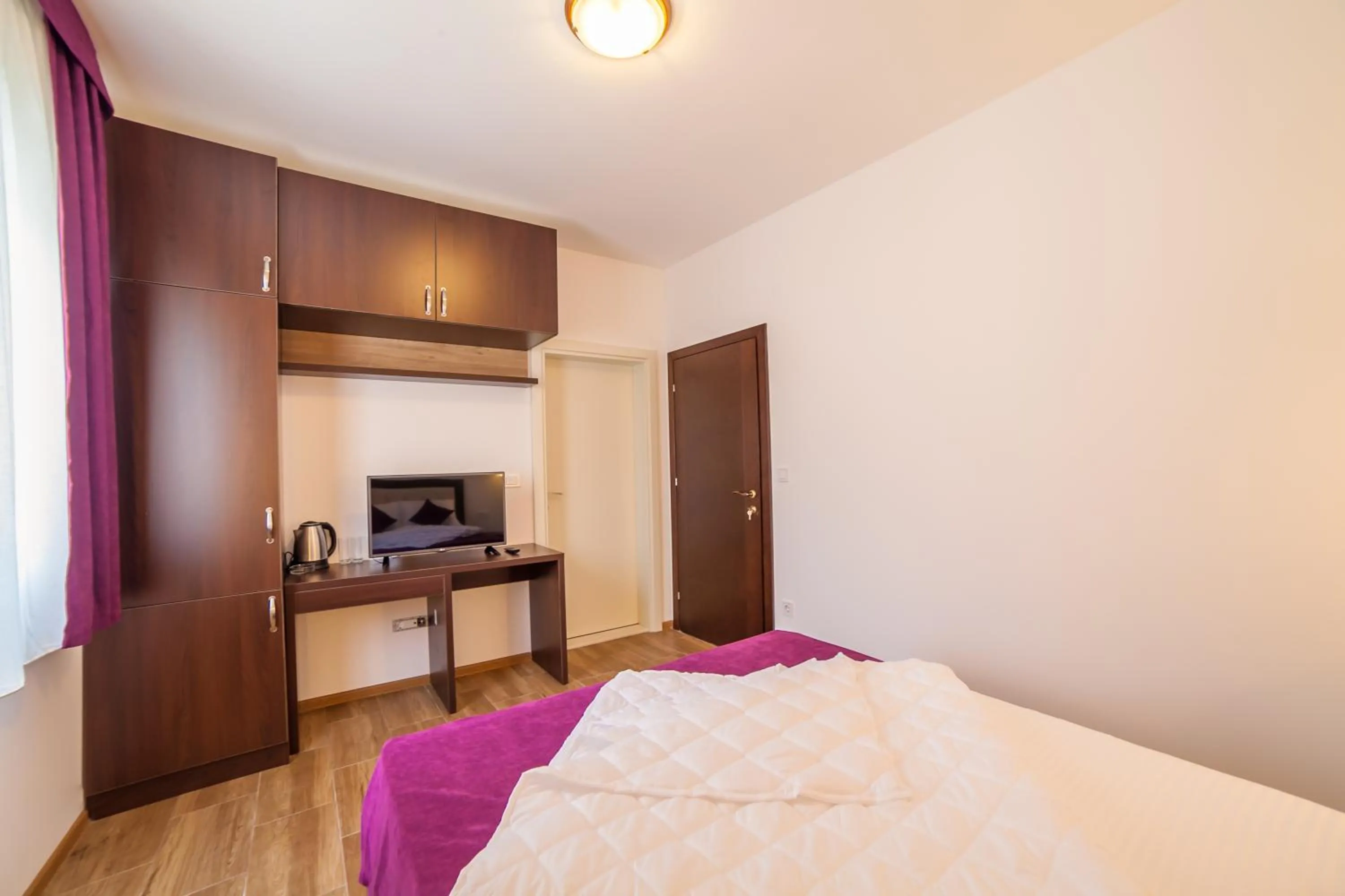 Bedroom, Bed in Aqua Breeze Apartments
