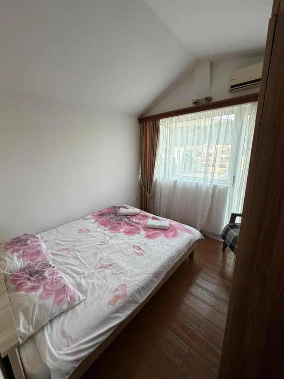 Bed in Aqua Breeze Apartments