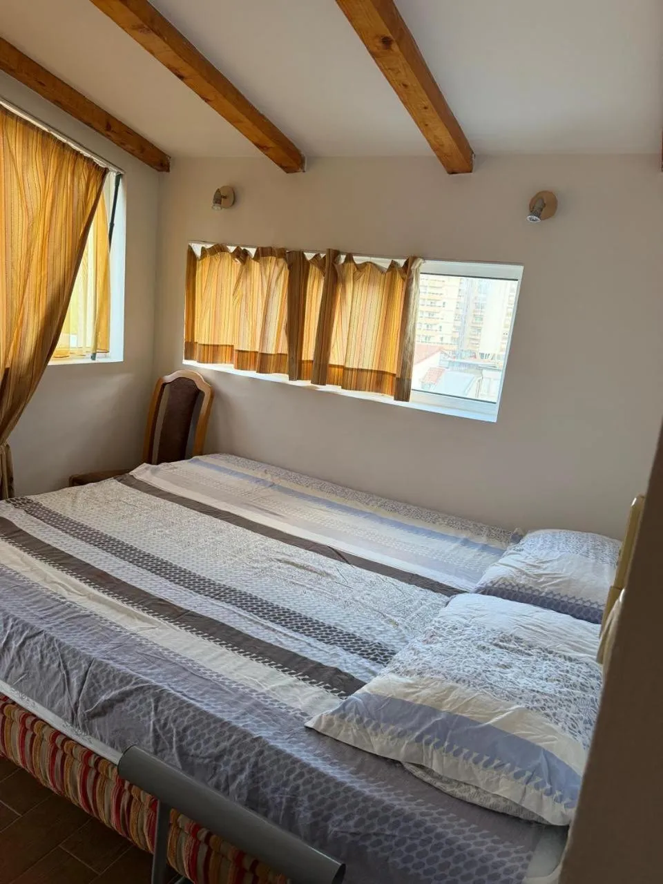 Bed in Aqua Breeze Apartments