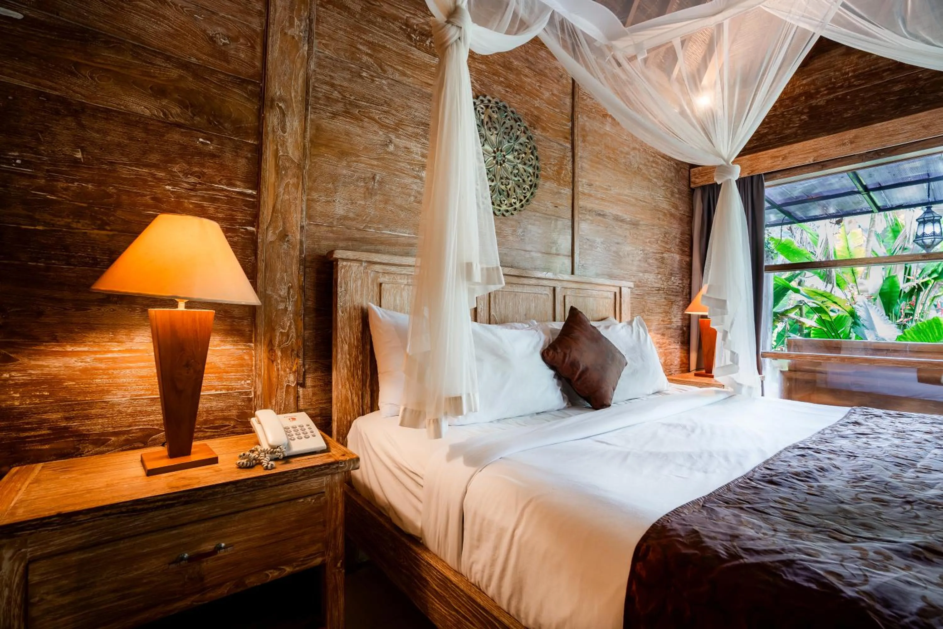 Bed in Bije Suite Villa Ubud