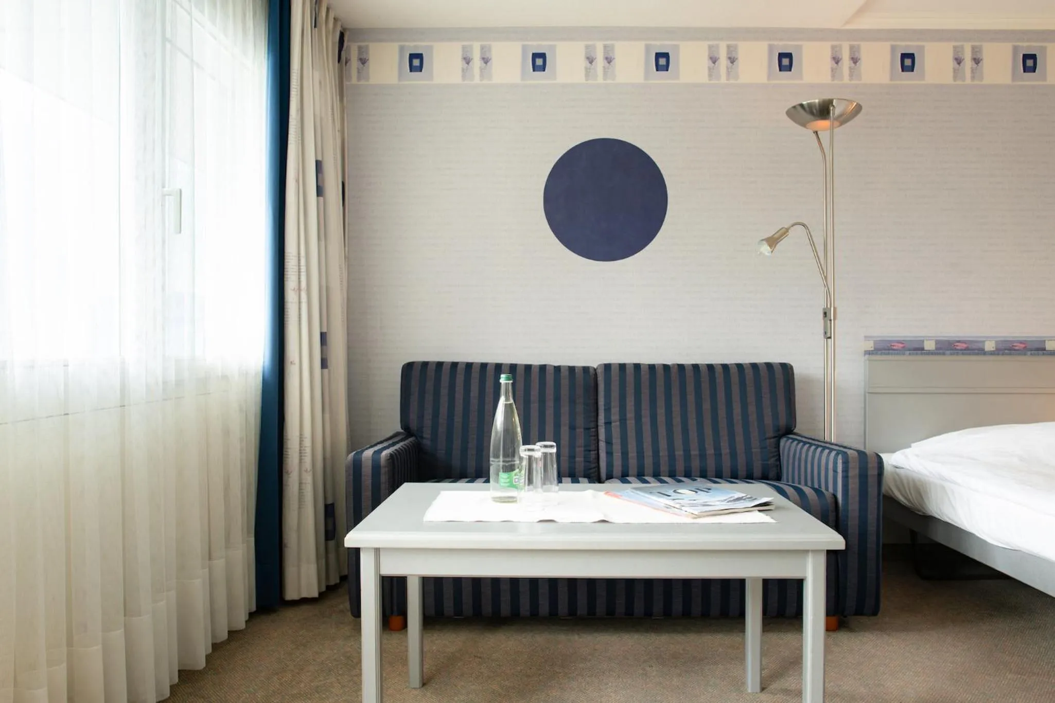 Seating area, Bed in Seiler au Lac