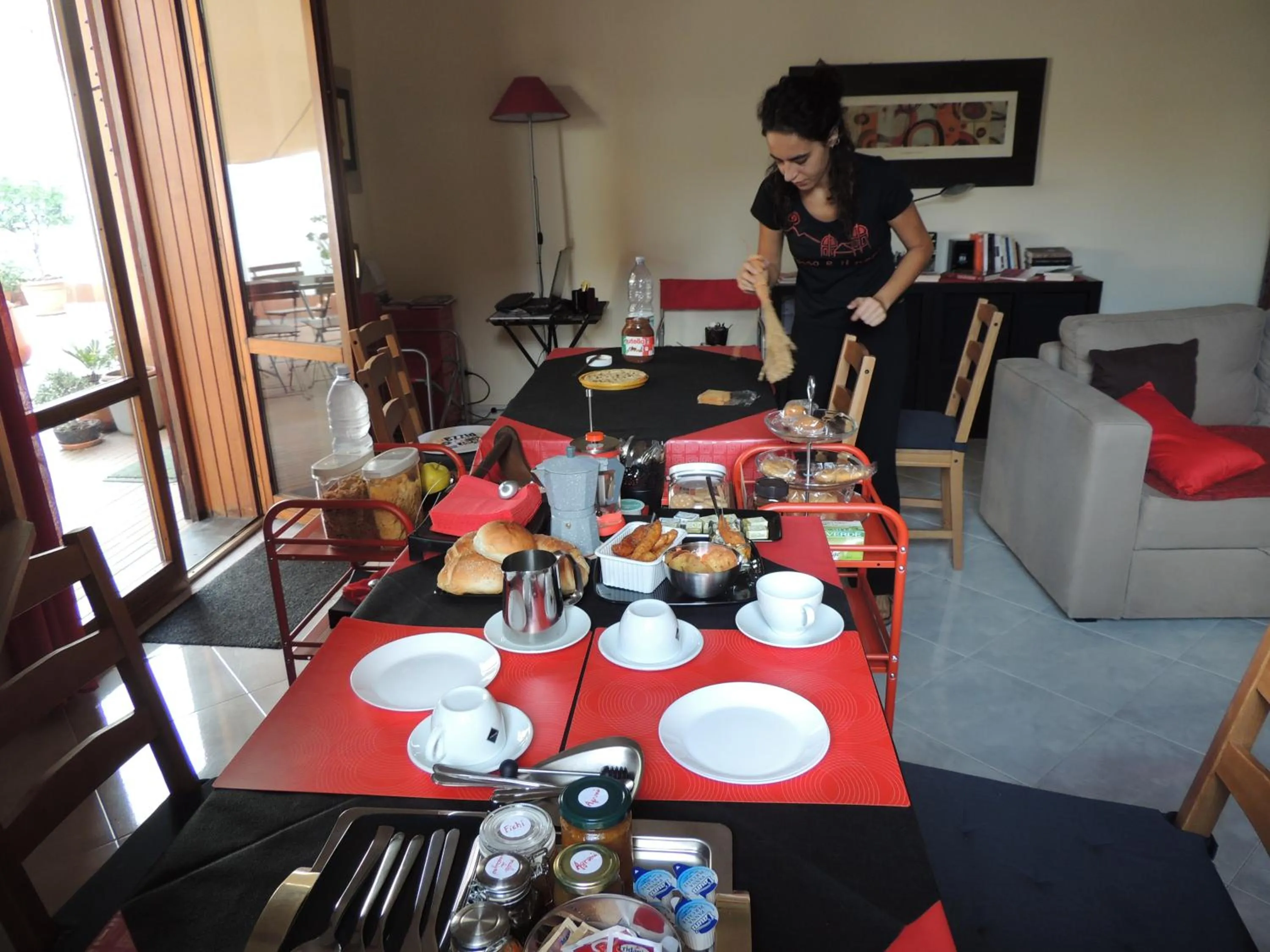 Communal lounge/ TV room in B&B il rosso e il nero