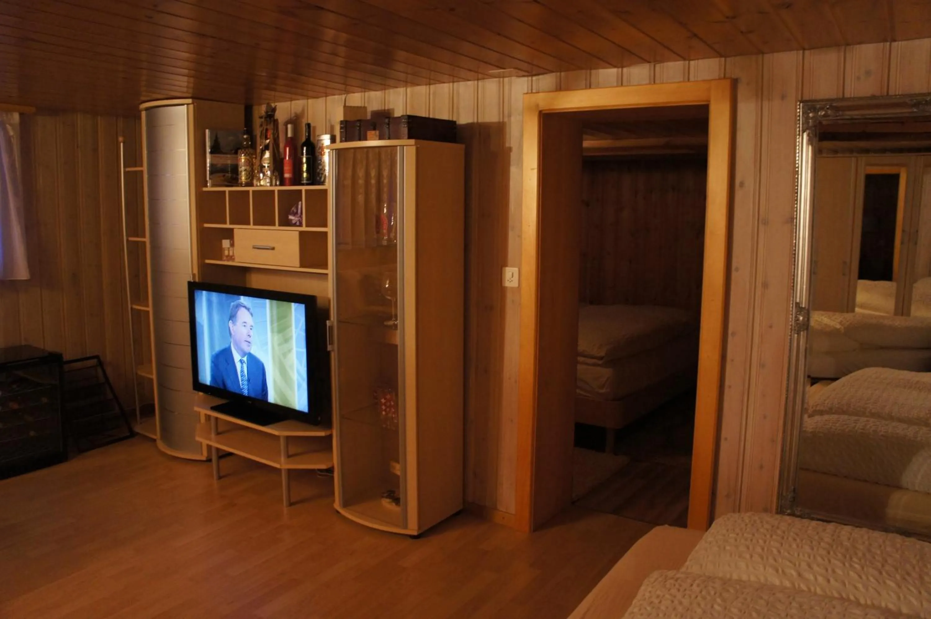 Living room, Bed in Petit Helvetia Budget Hotel