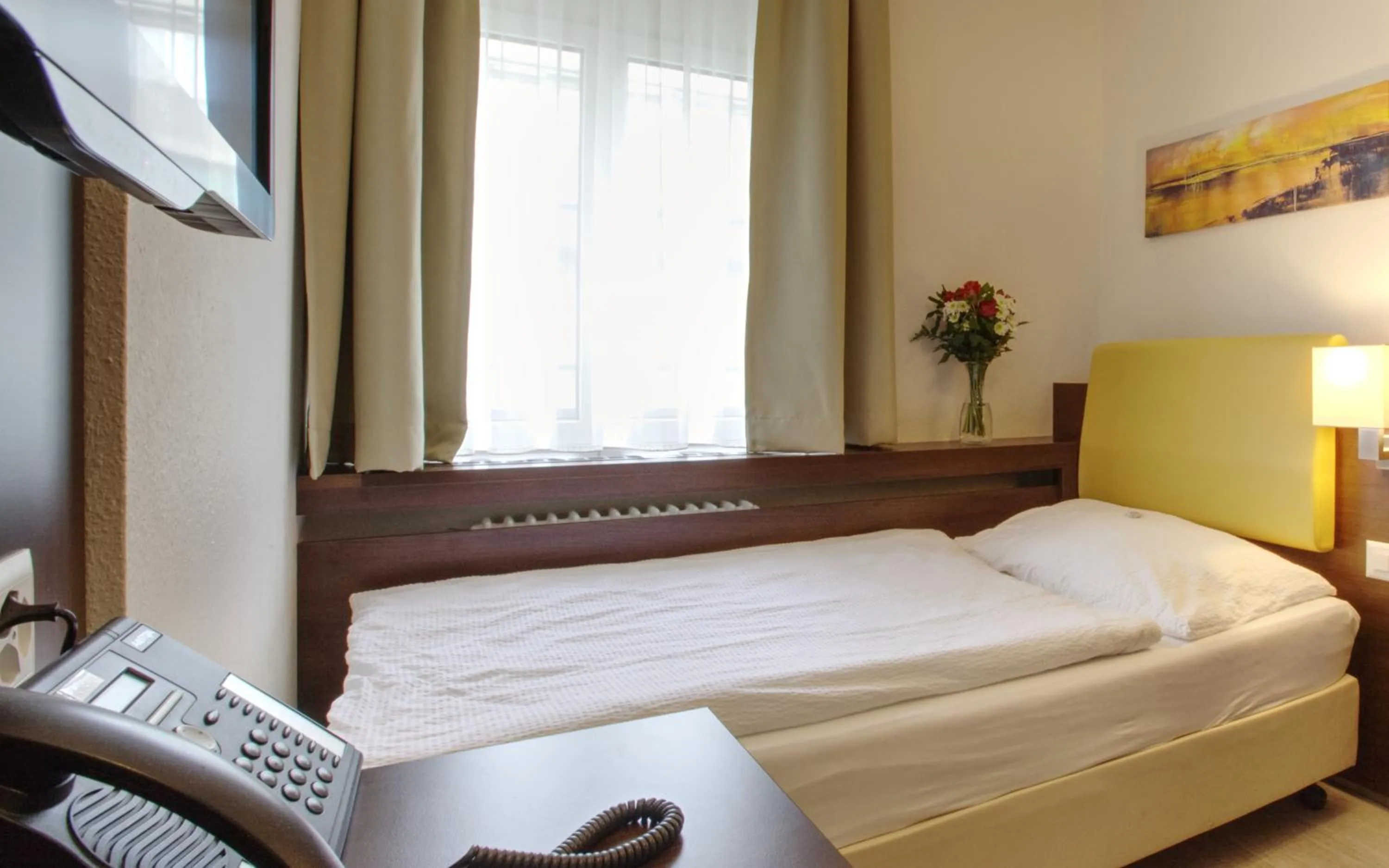 Bed in Hotel Rheinfelderhof