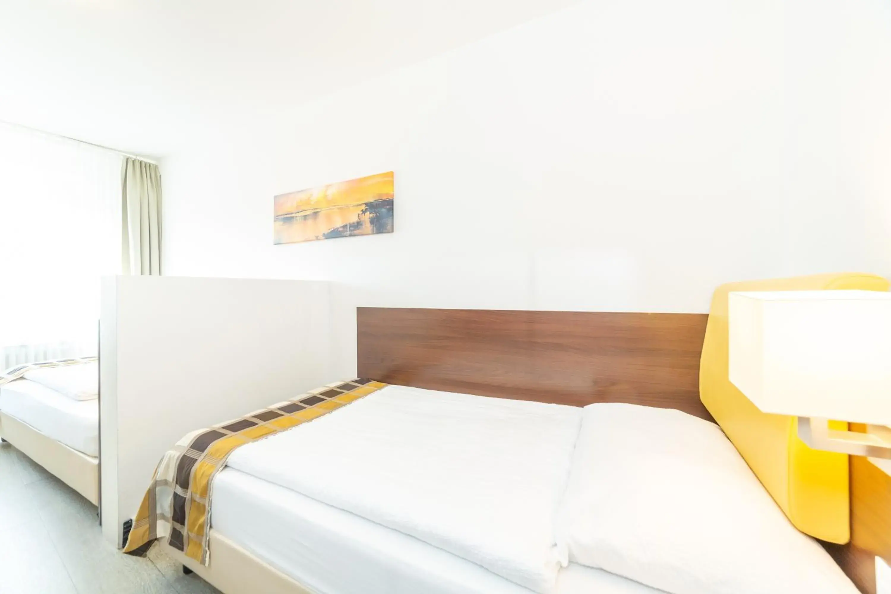 Bed in Hotel Rheinfelderhof Bed in Hotel Rheinfelderhof