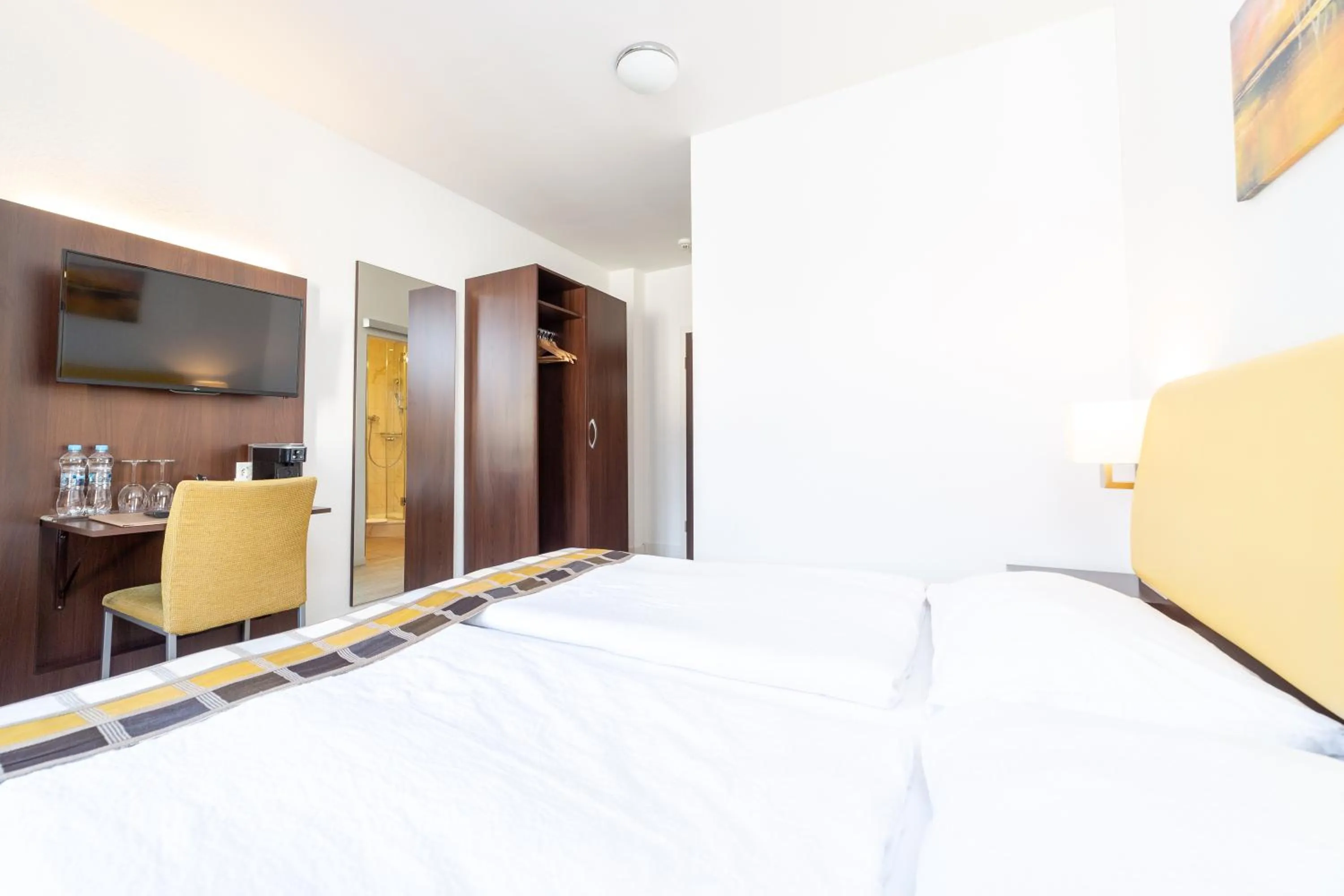 Bed in Hotel Rheinfelderhof