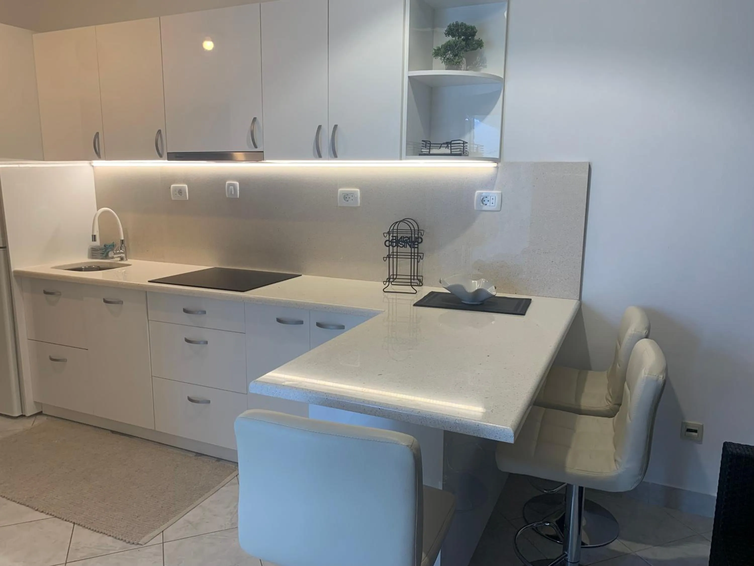 kitchen in Lumbarda Resort Apartments