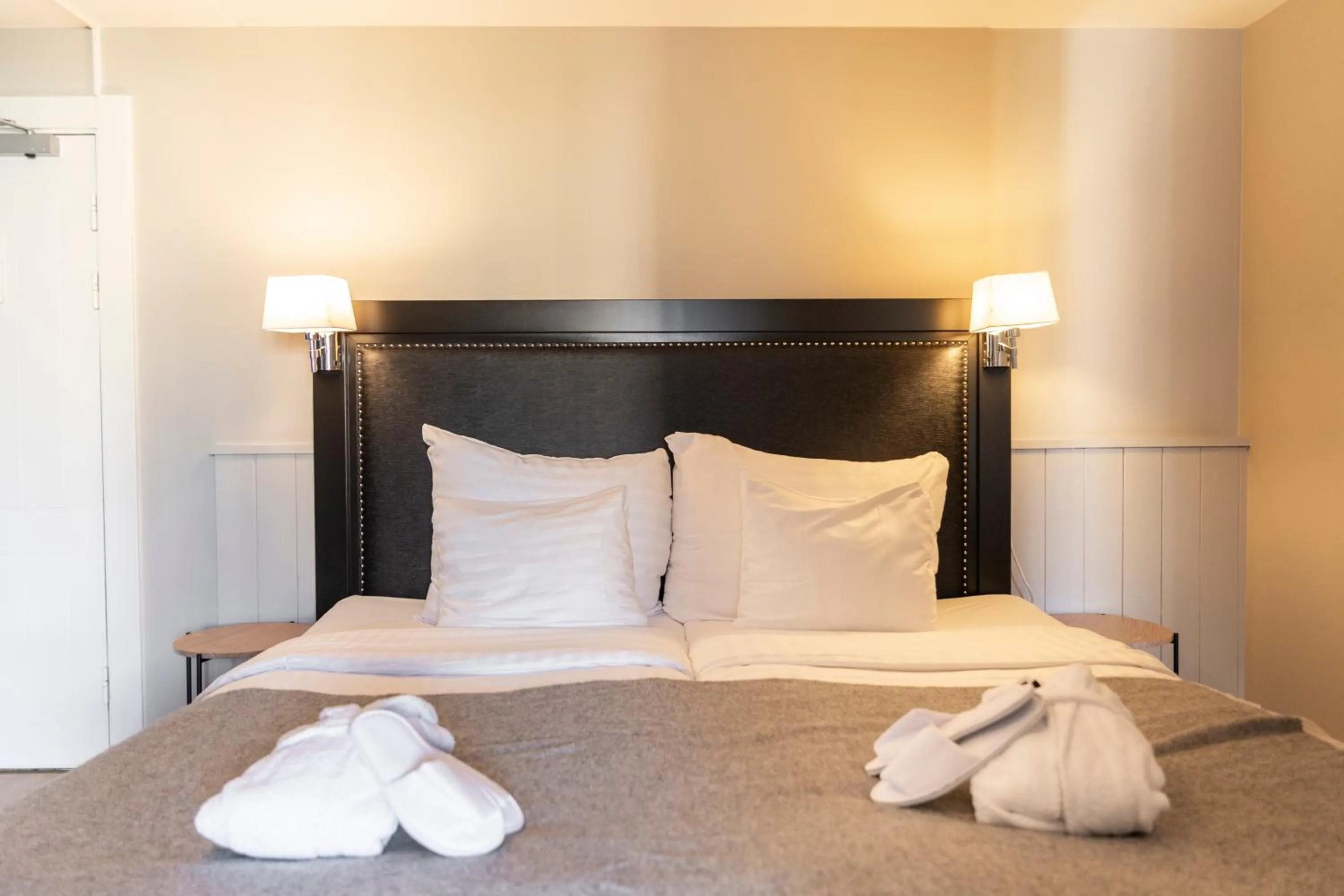 Bed in Home Hotel Tapto