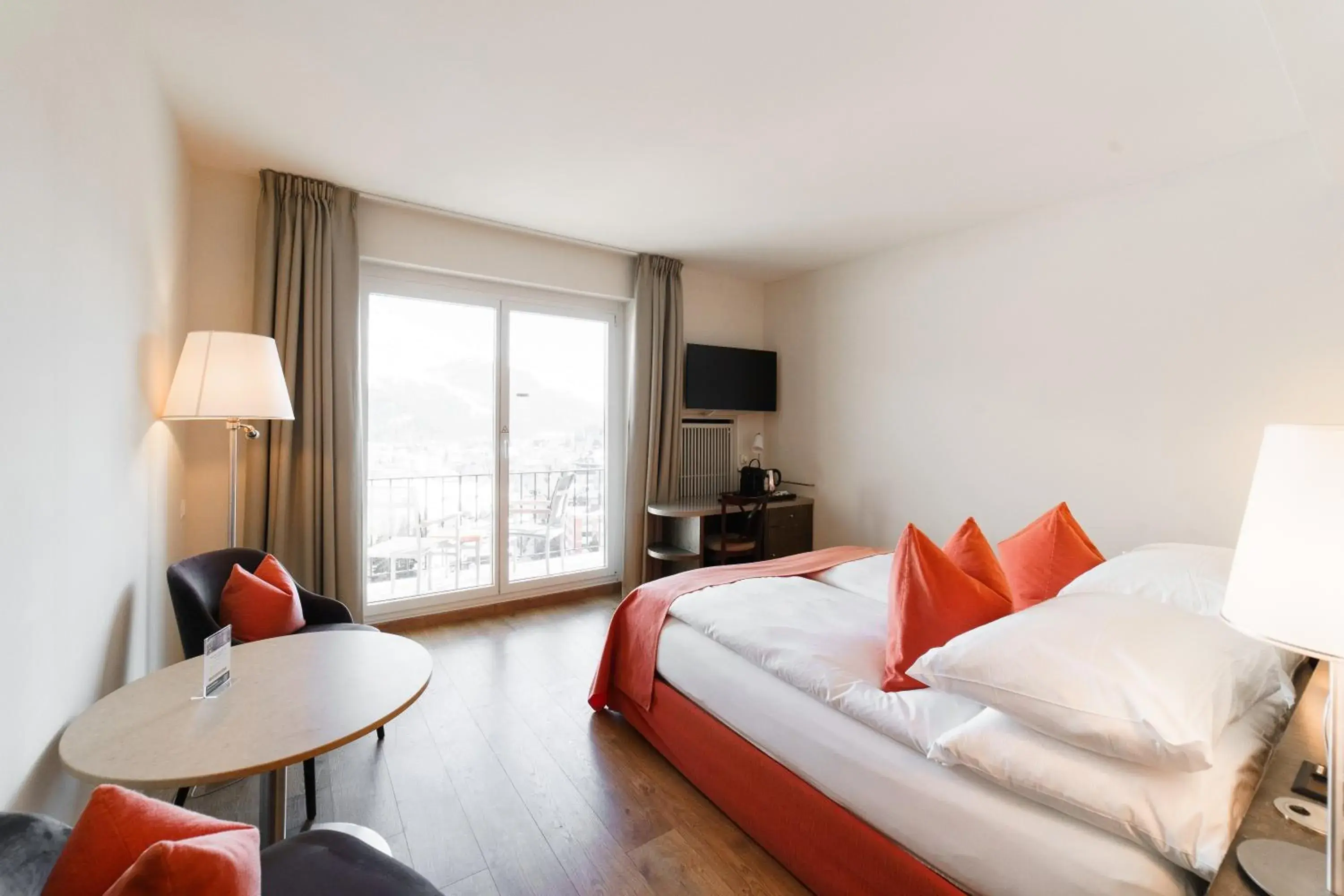 TV and multimedia, Bed in Hotel Schweizerhof St. Moritz TV and multimedia, Bed in Hotel Schweizerhof St. Moritz