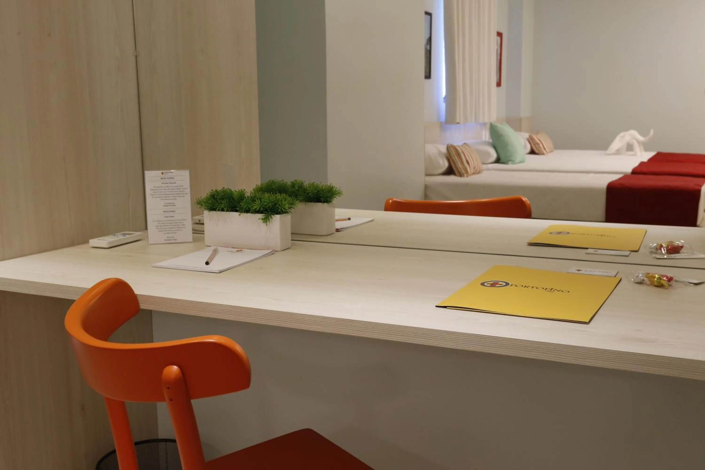 Bed in Portofino Hotel