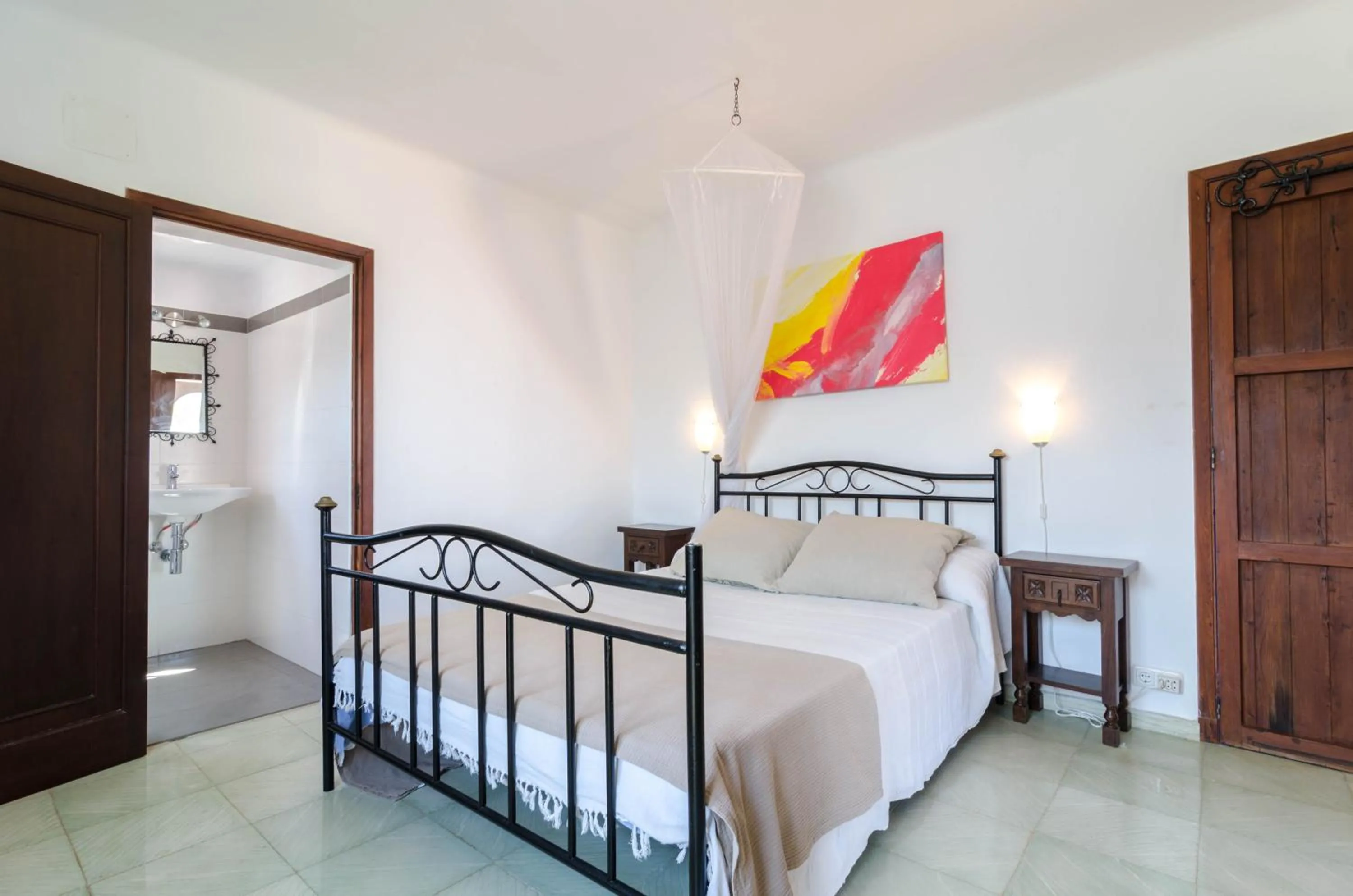 Bathroom, Bed in Villa Cala Esmeralda