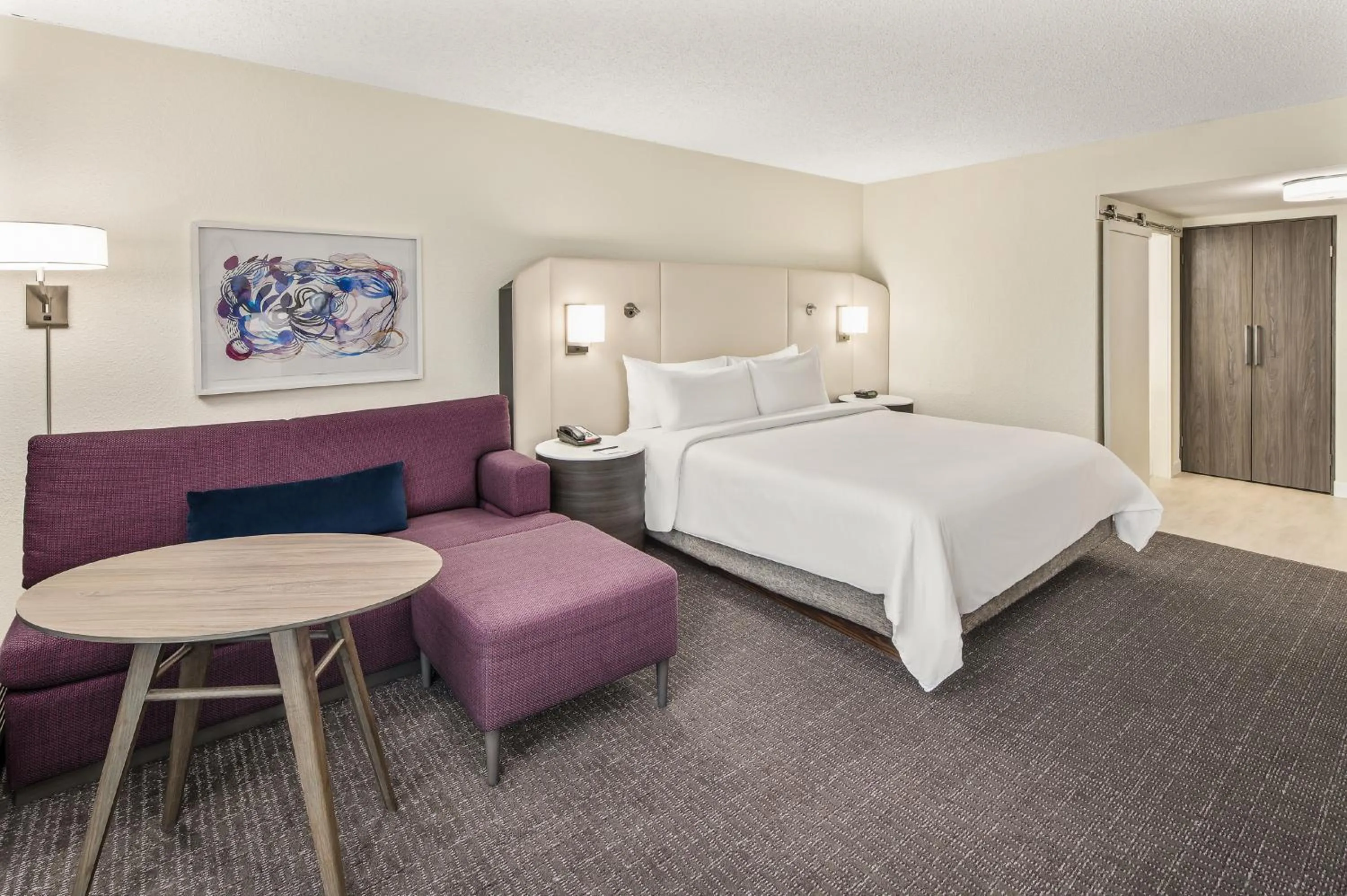 Living room, Bed in Crowne Plaza Orlando - Lake Buena Vista by IHG