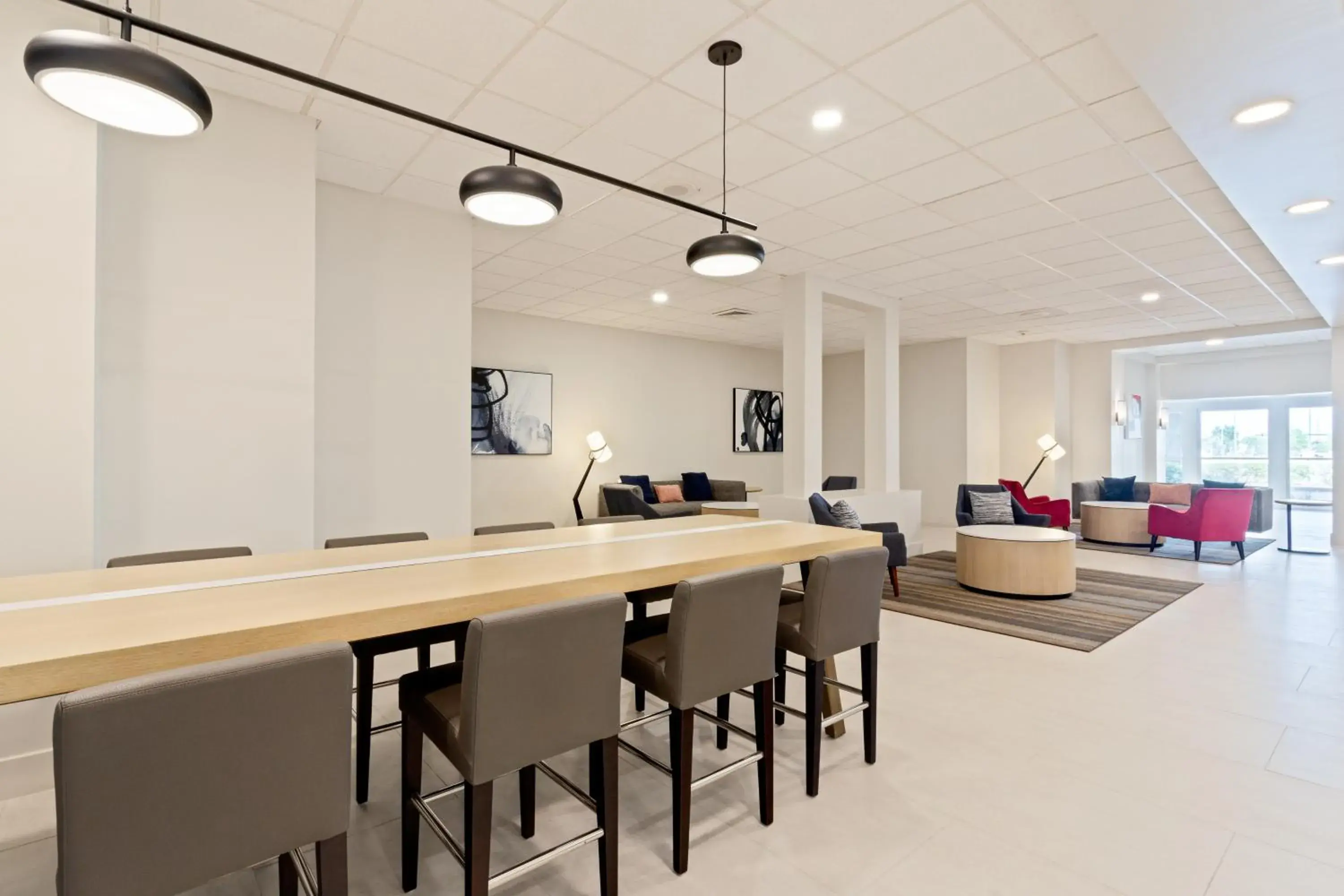 Lobby or reception in Holiday Inn & Suites Across from Universal Orlando by IHG Lobby or reception in Holiday Inn & Suites Across from Universal Orlando by IHG